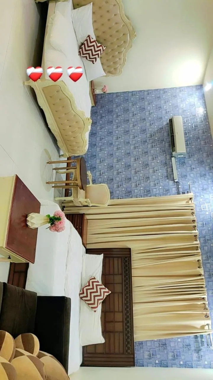 Bed in Comfyinn Guest House