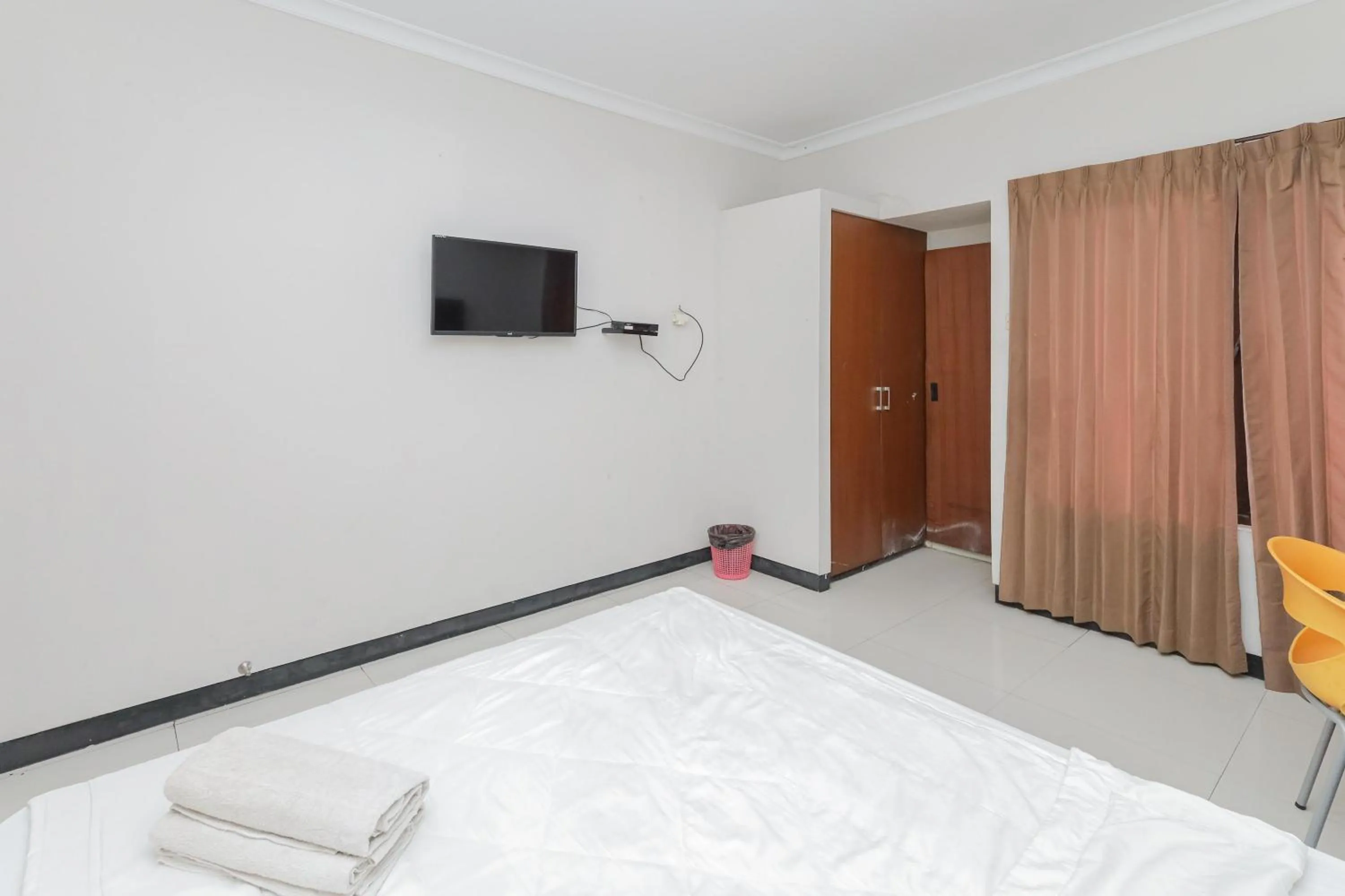 Bedroom in KoolKost near Tunjungan Plaza