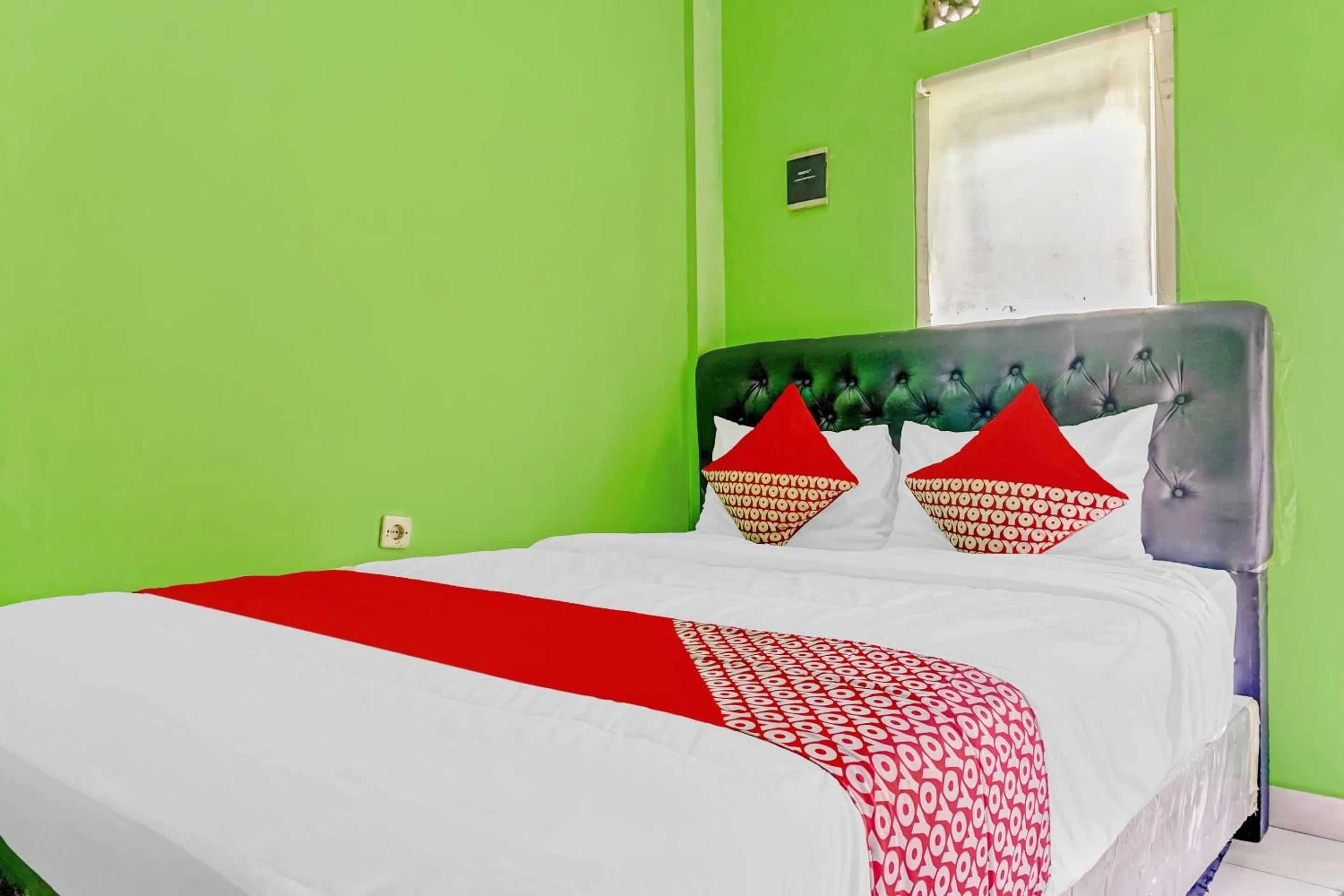 Bedroom in OYO 90792 Kosku Syariah