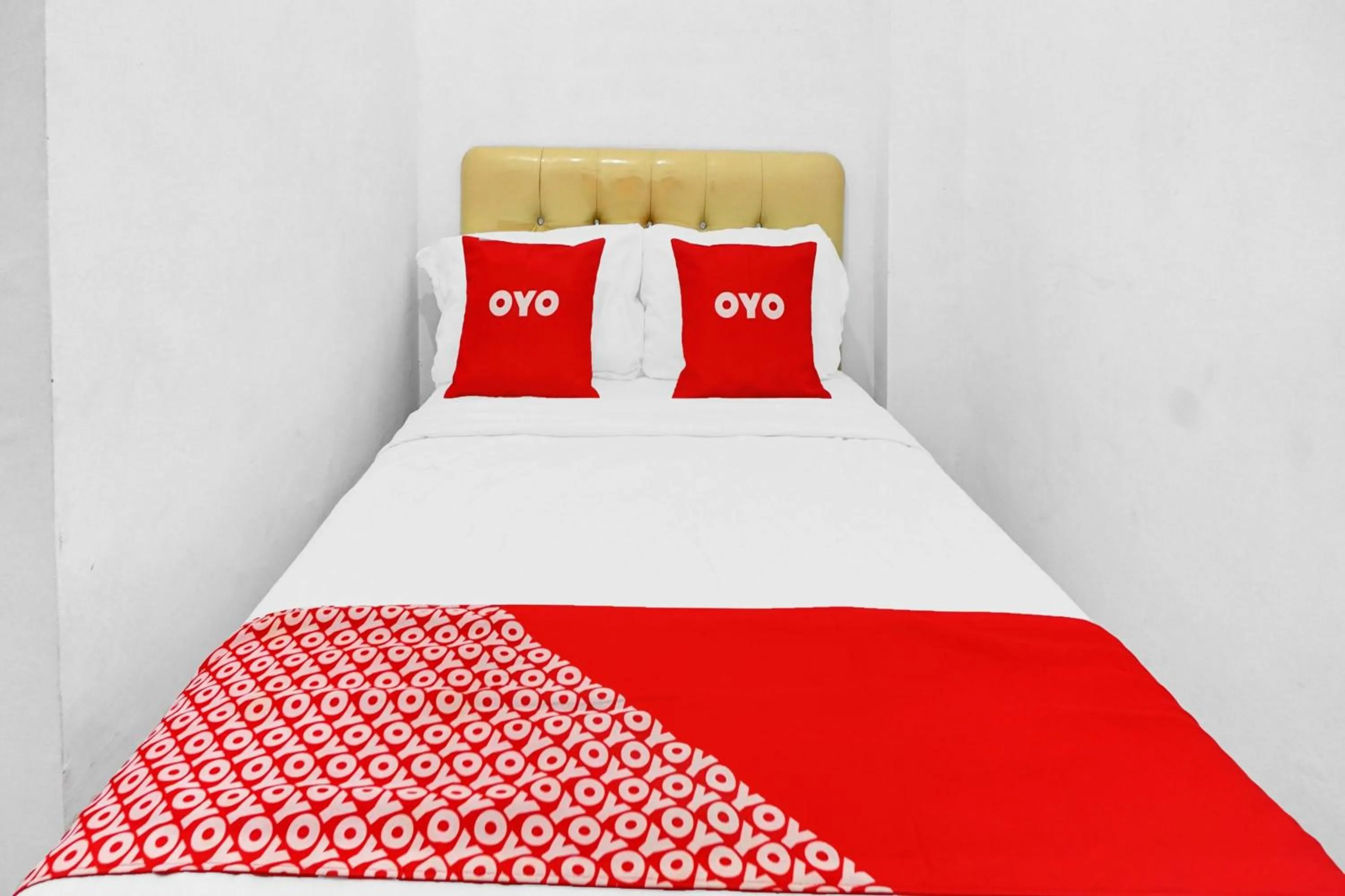 Bedroom in Hotel O Btc Guest House Syariah