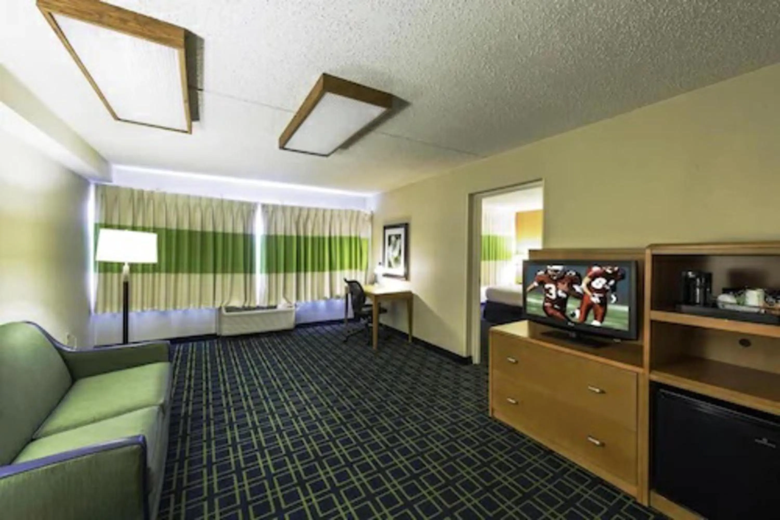 Seating area, Bed in Days Inn by Wyndham Absecon Atlantic City Area