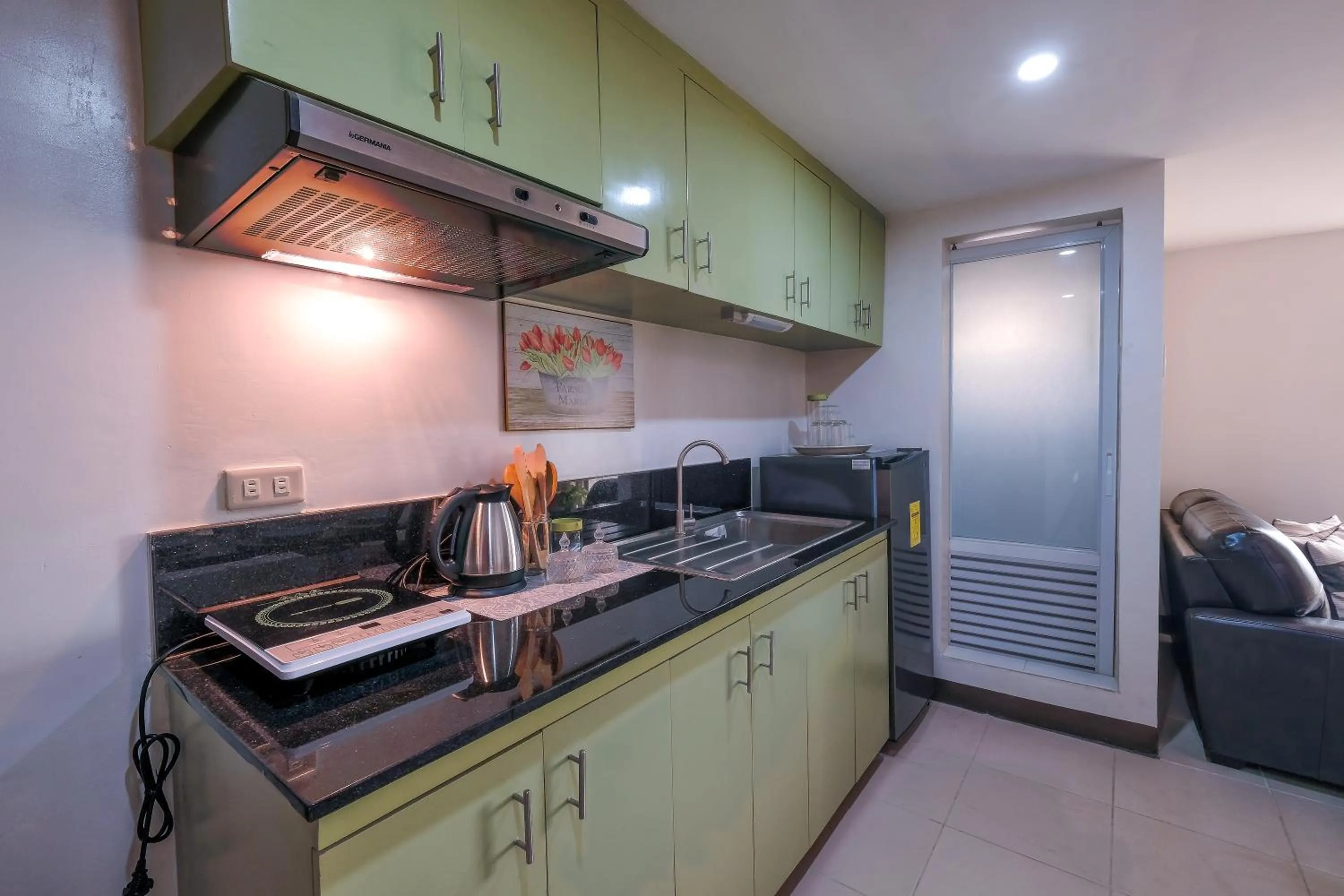 Kitchen or kitchenette in FB DORMITEL SUITES