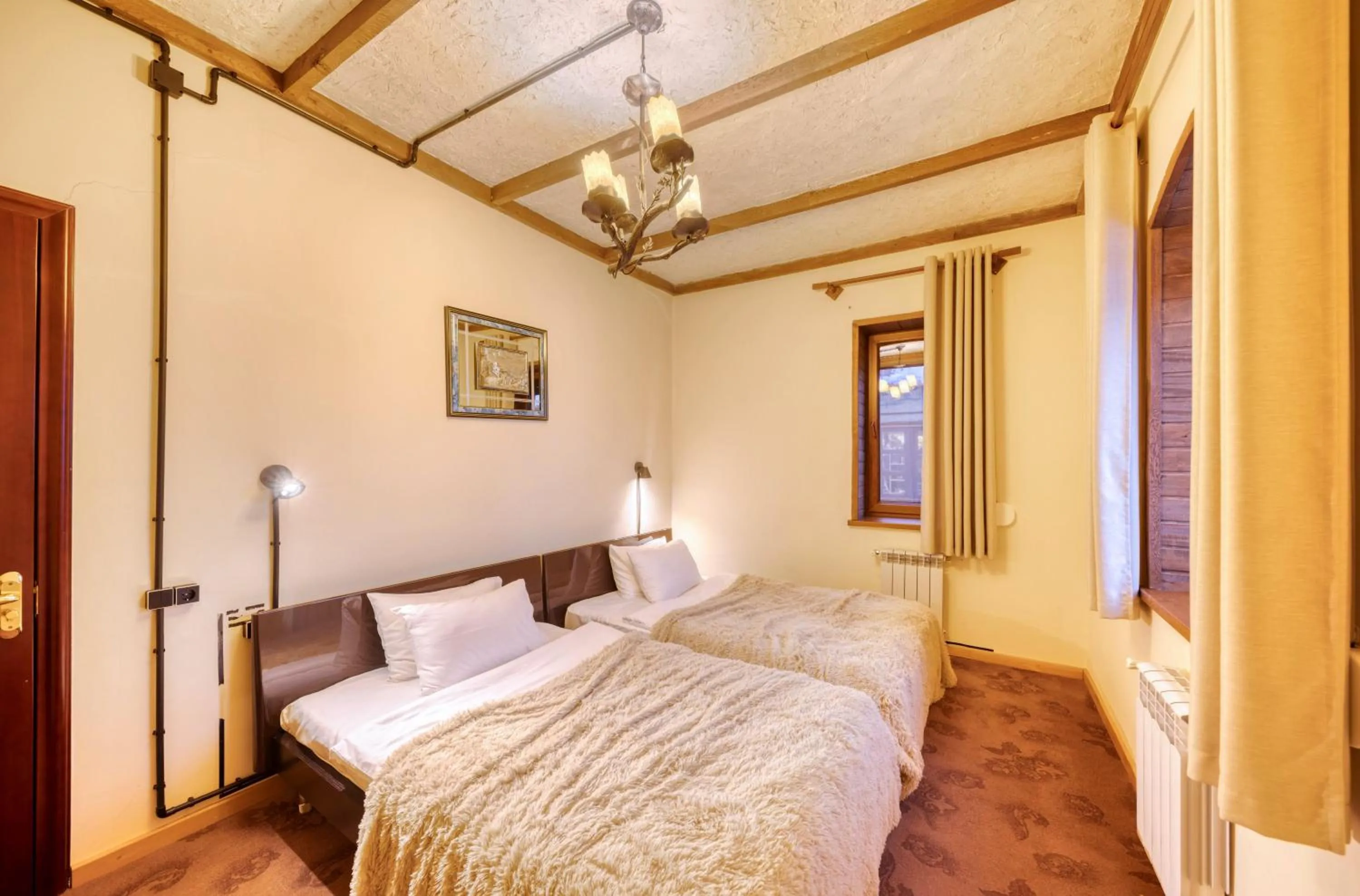 Bed in Alpine Castle Hotel