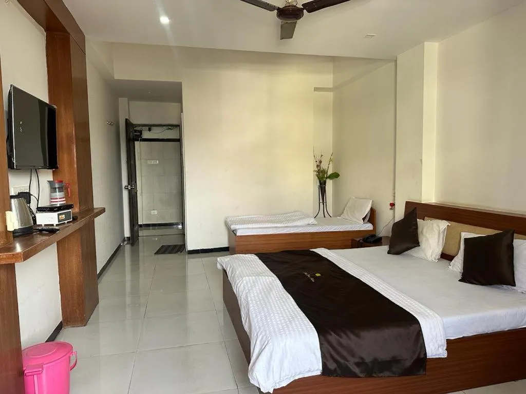 Photo of the whole room, Bed in Hotel Dhruv Palace