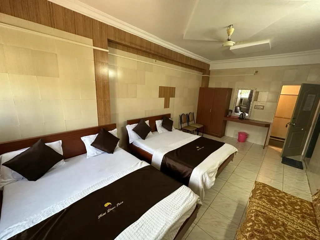 Bed in Hotel Dhruv Palace