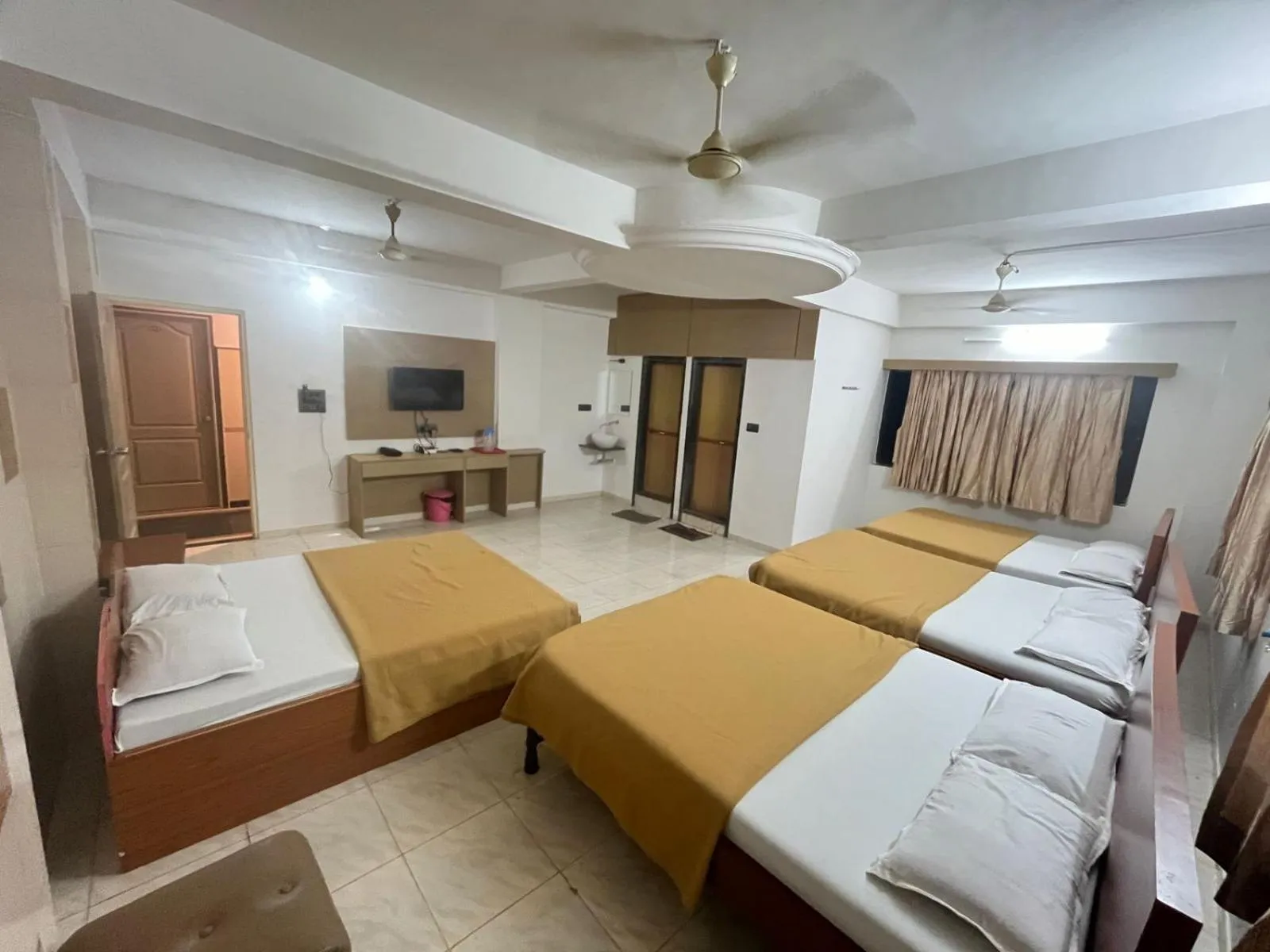 Bed in Hotel Dhruv Palace