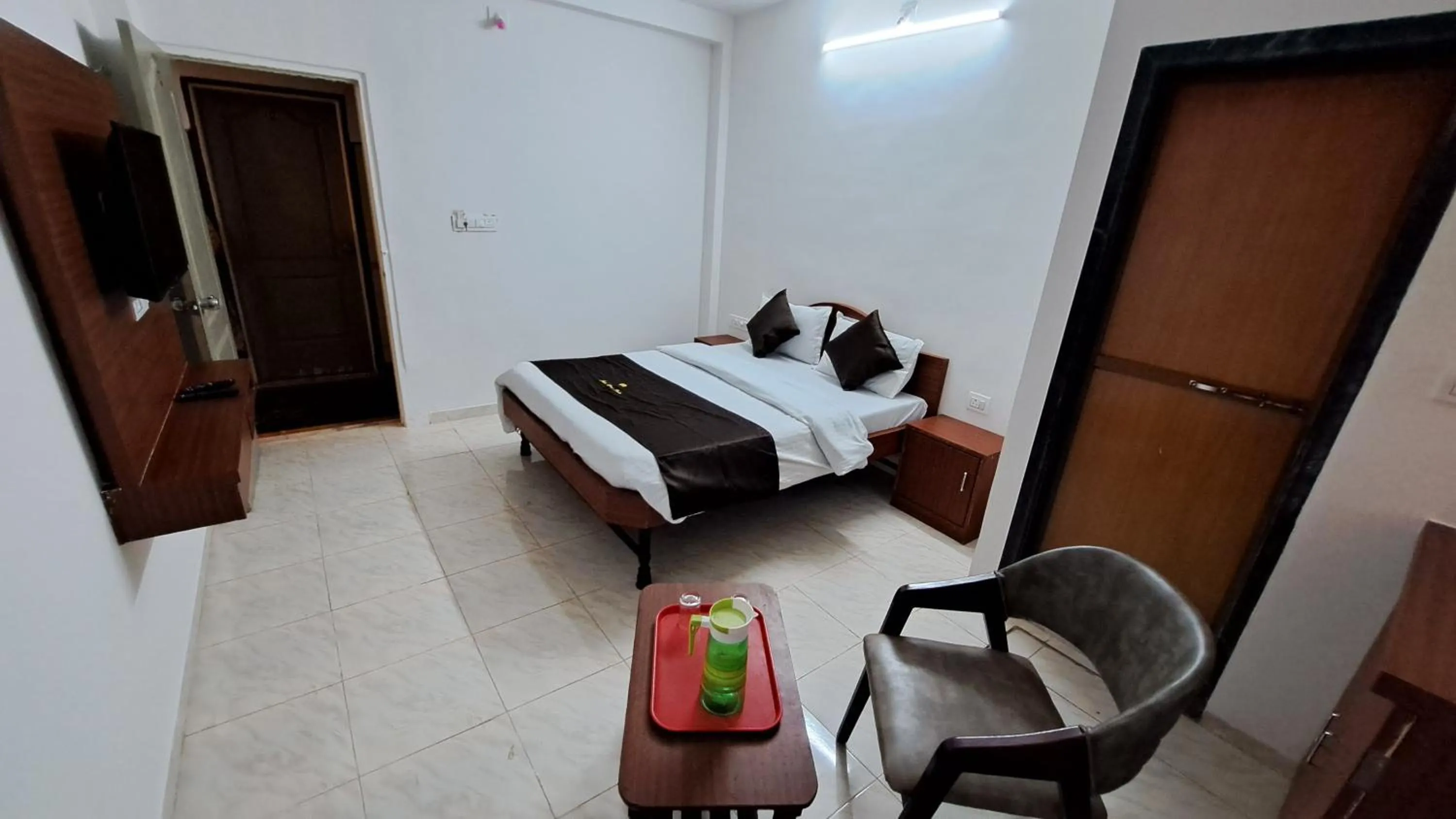 Bed in Hotel Dhruv Palace