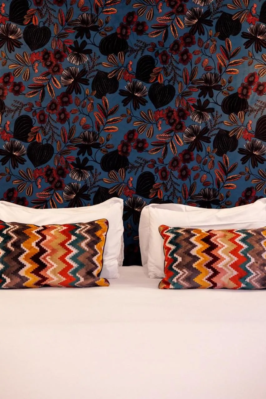 Bed in Hotel de Fleurie - Saint-Germain-des-Pres