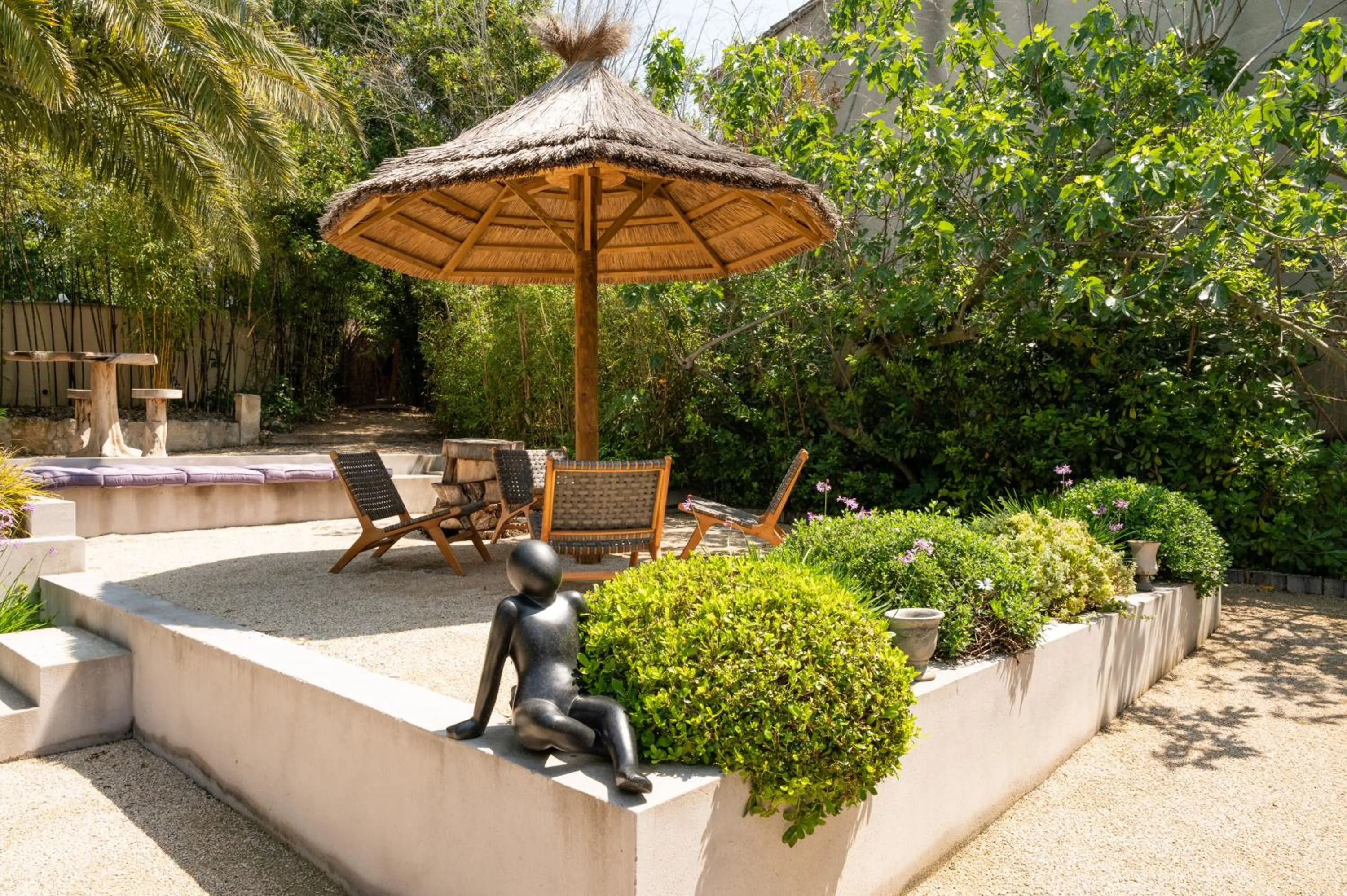 Garden in Hôtel l'Amandière
