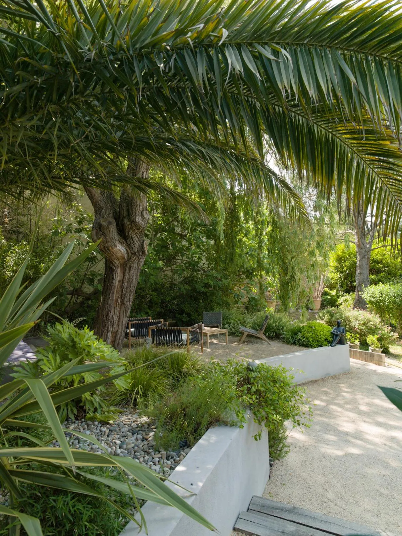 Garden in Hôtel l'Amandière