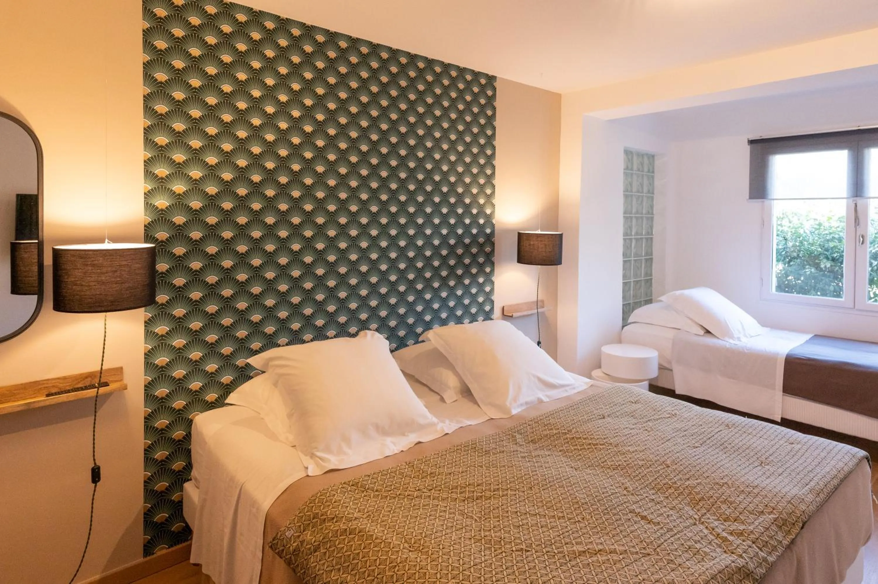 Bed in Hôtel l'Amandière