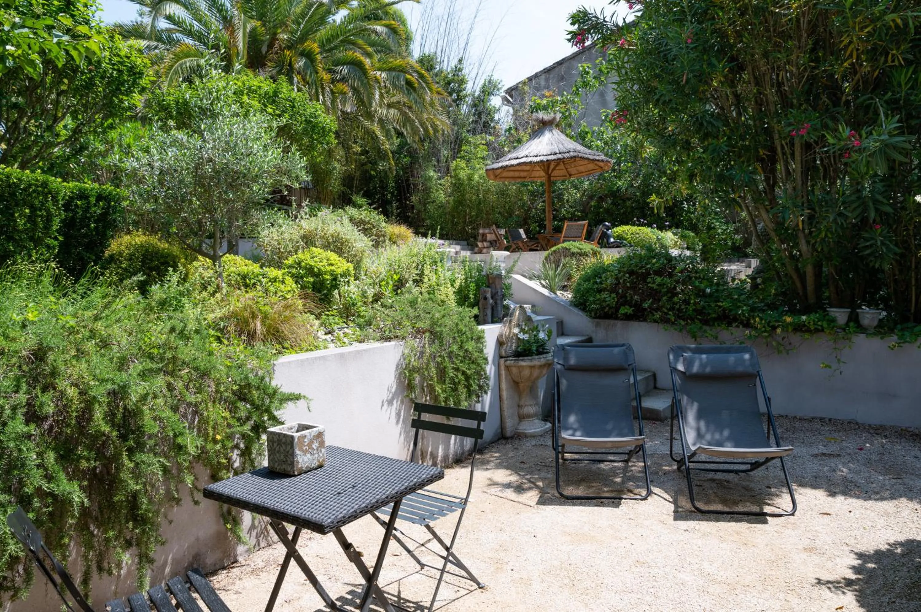 Garden in Hôtel l'Amandière