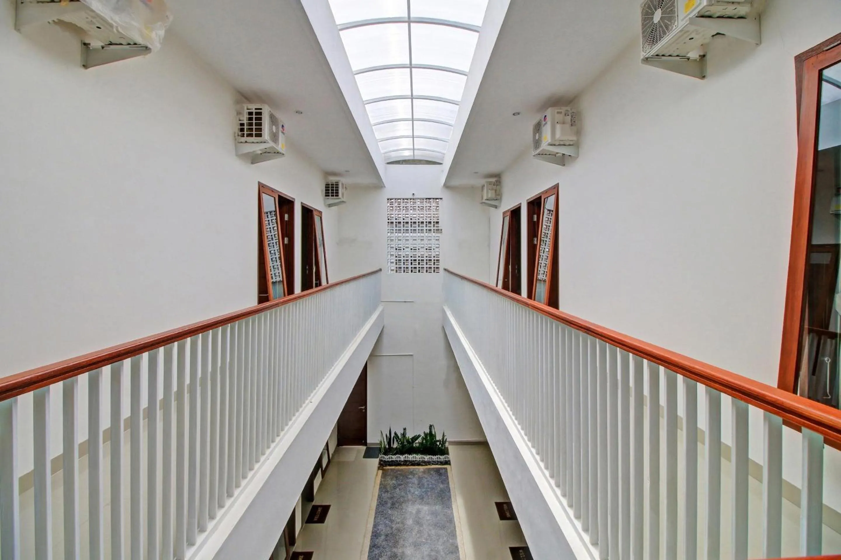 Lobby or reception in Hotel O Madania Guesthouse Syariah