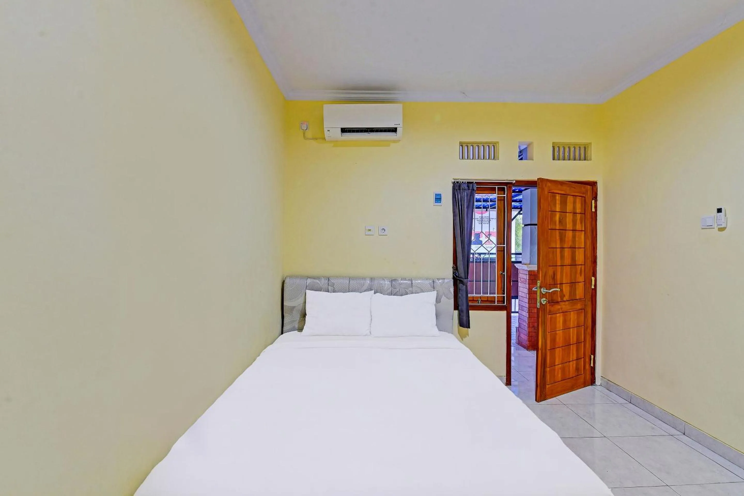 Bedroom in Hotel O Casa Jupiter Shine