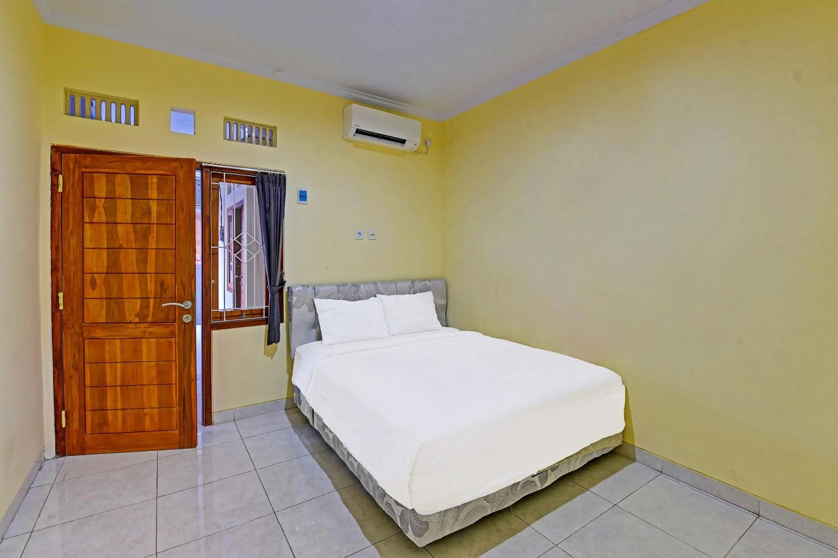 Bedroom in Hotel O Casa Jupiter Shine