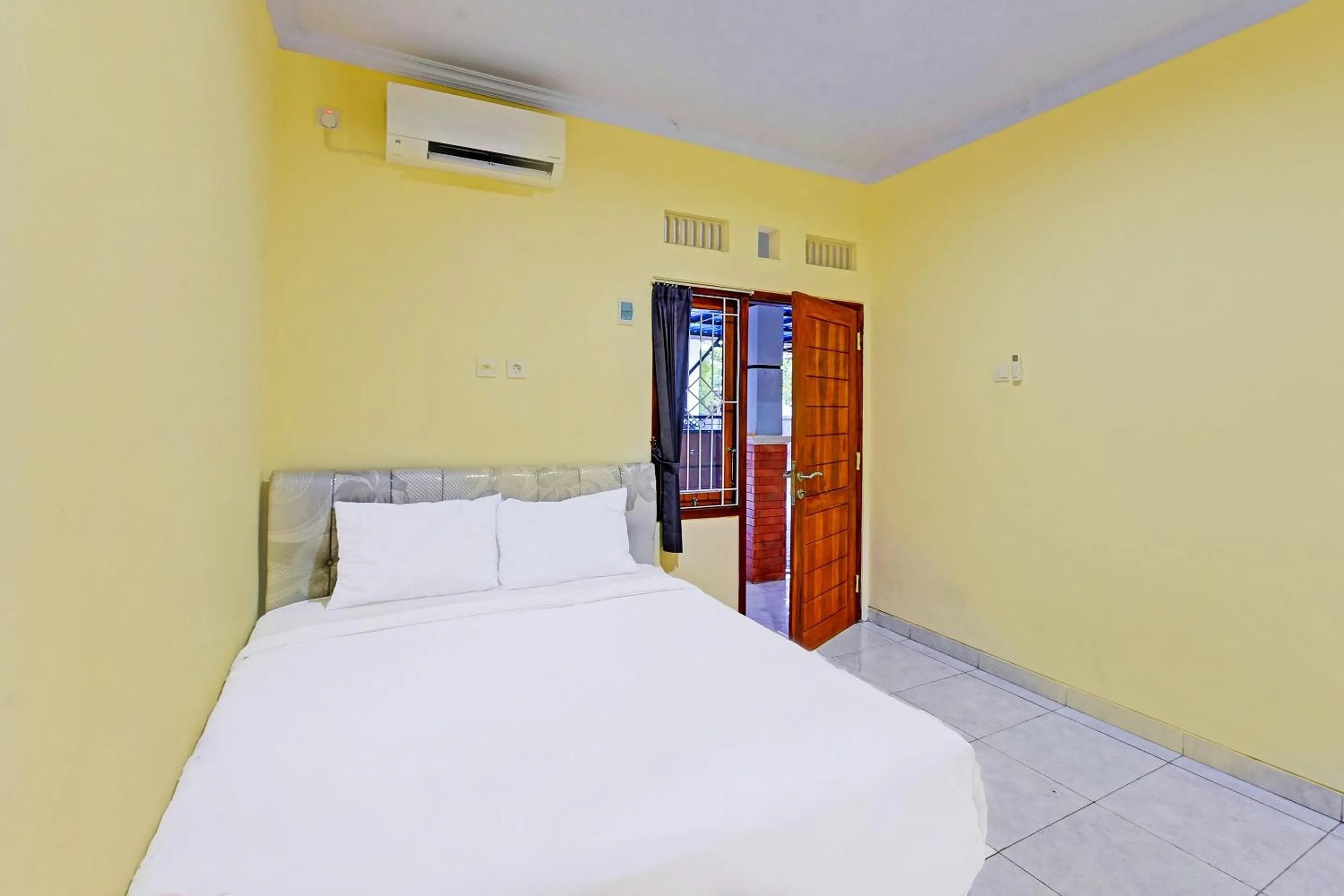 Bedroom in Hotel O Casa Jupiter Shine