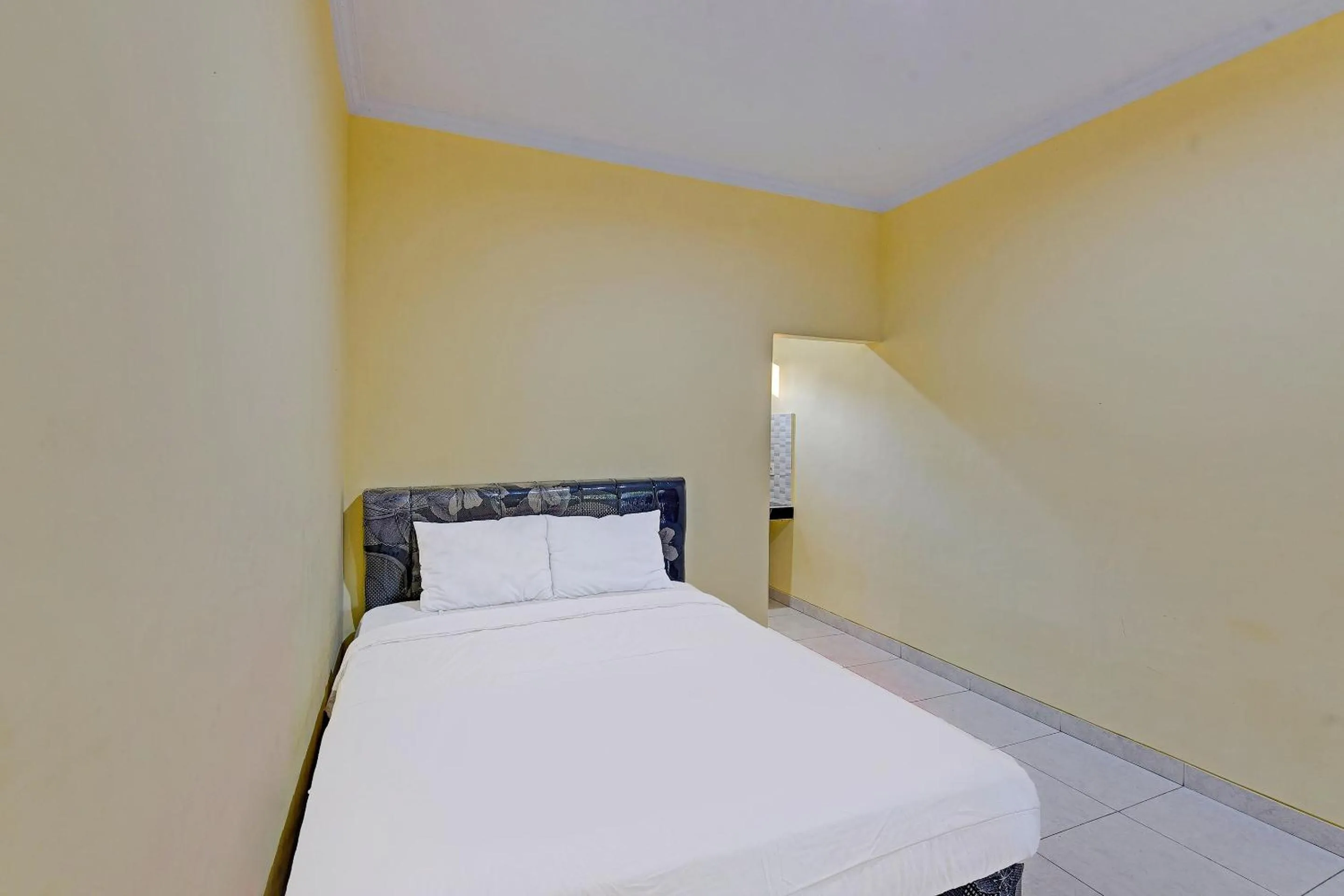 Bedroom in Hotel O Casa Jupiter Shine