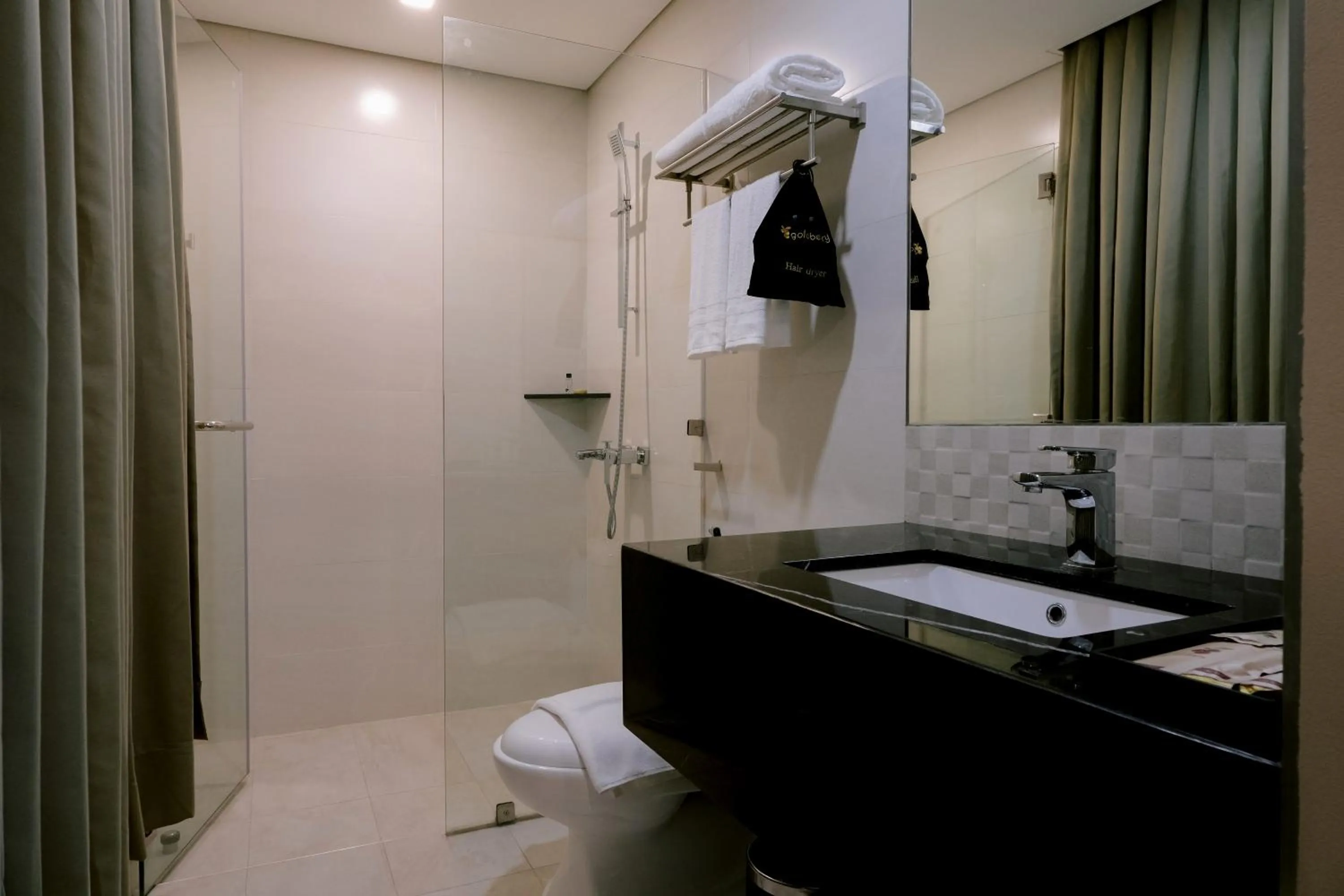 Bathroom in Goldberry Suites and Hotel Cebu