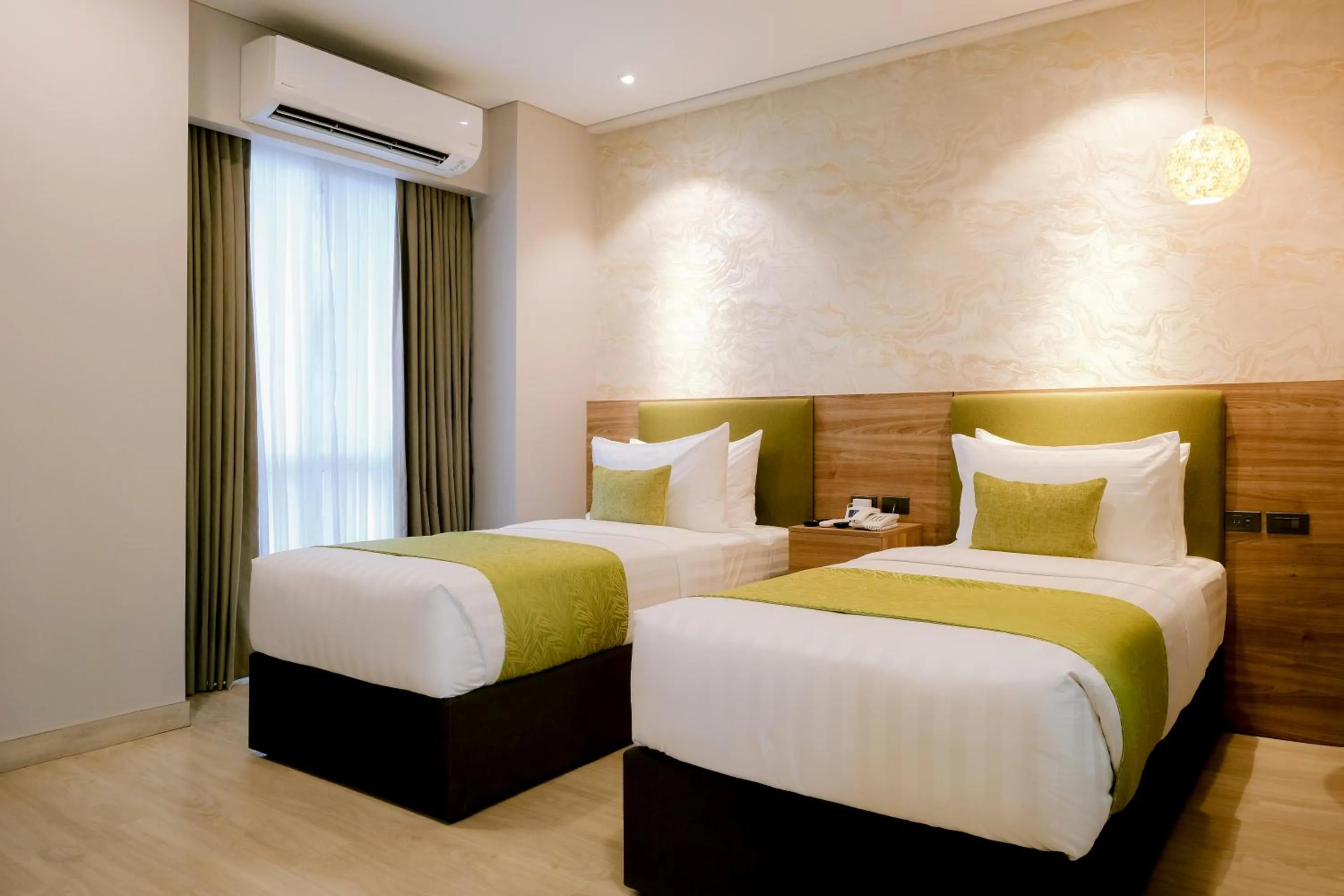 Bed in Goldberry Suites and Hotel Cebu