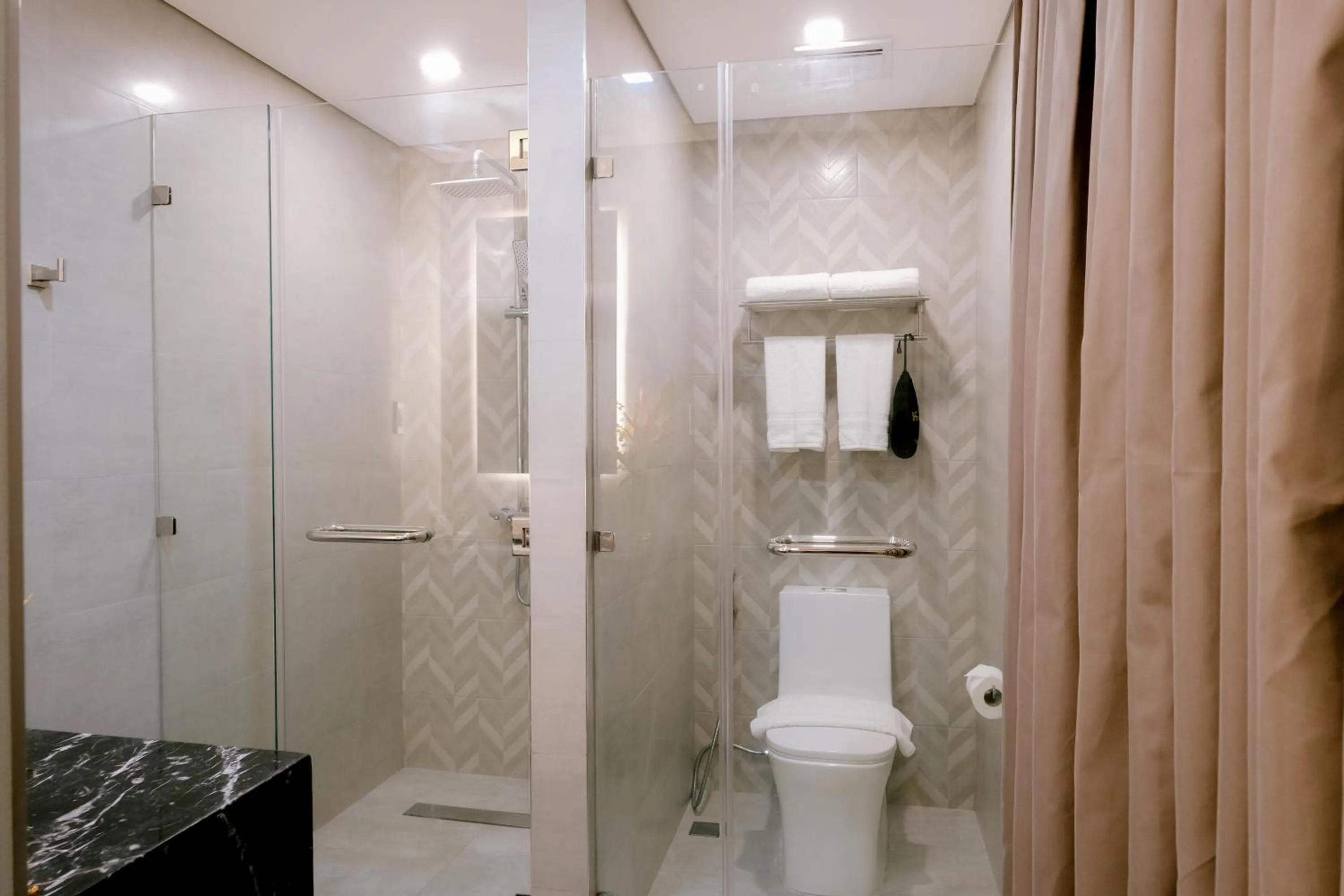 Shower in Goldberry Suites and Hotel Cebu