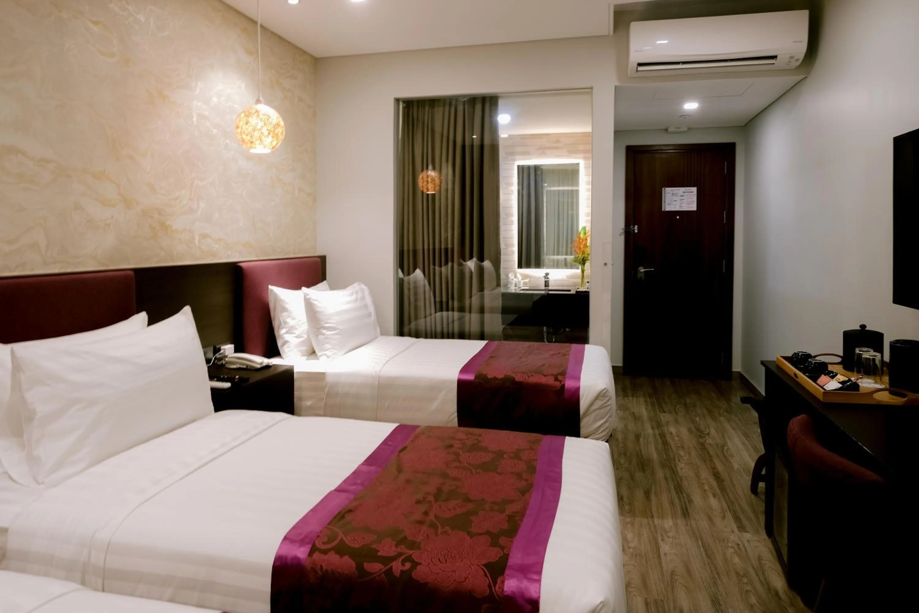 Bed in Goldberry Suites and Hotel Cebu