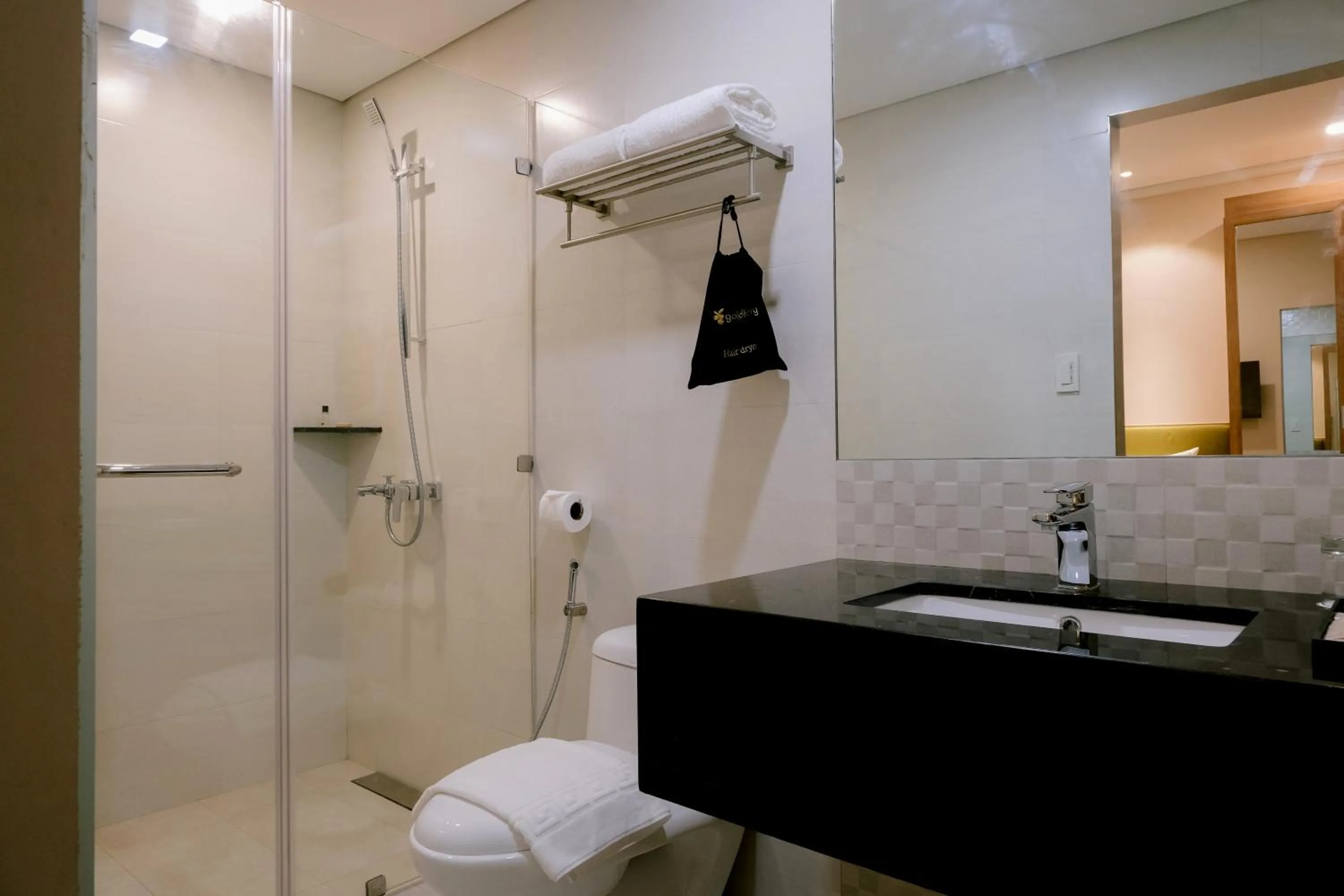 Shower in Goldberry Suites and Hotel Cebu