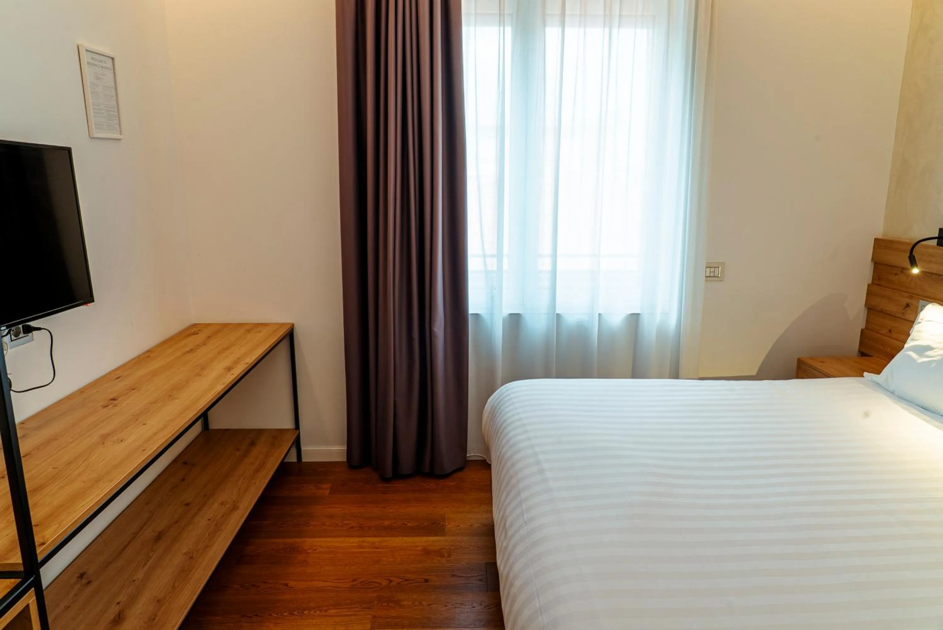 Photo of the whole room, Bed in GRANDI 32 Boutique Residence