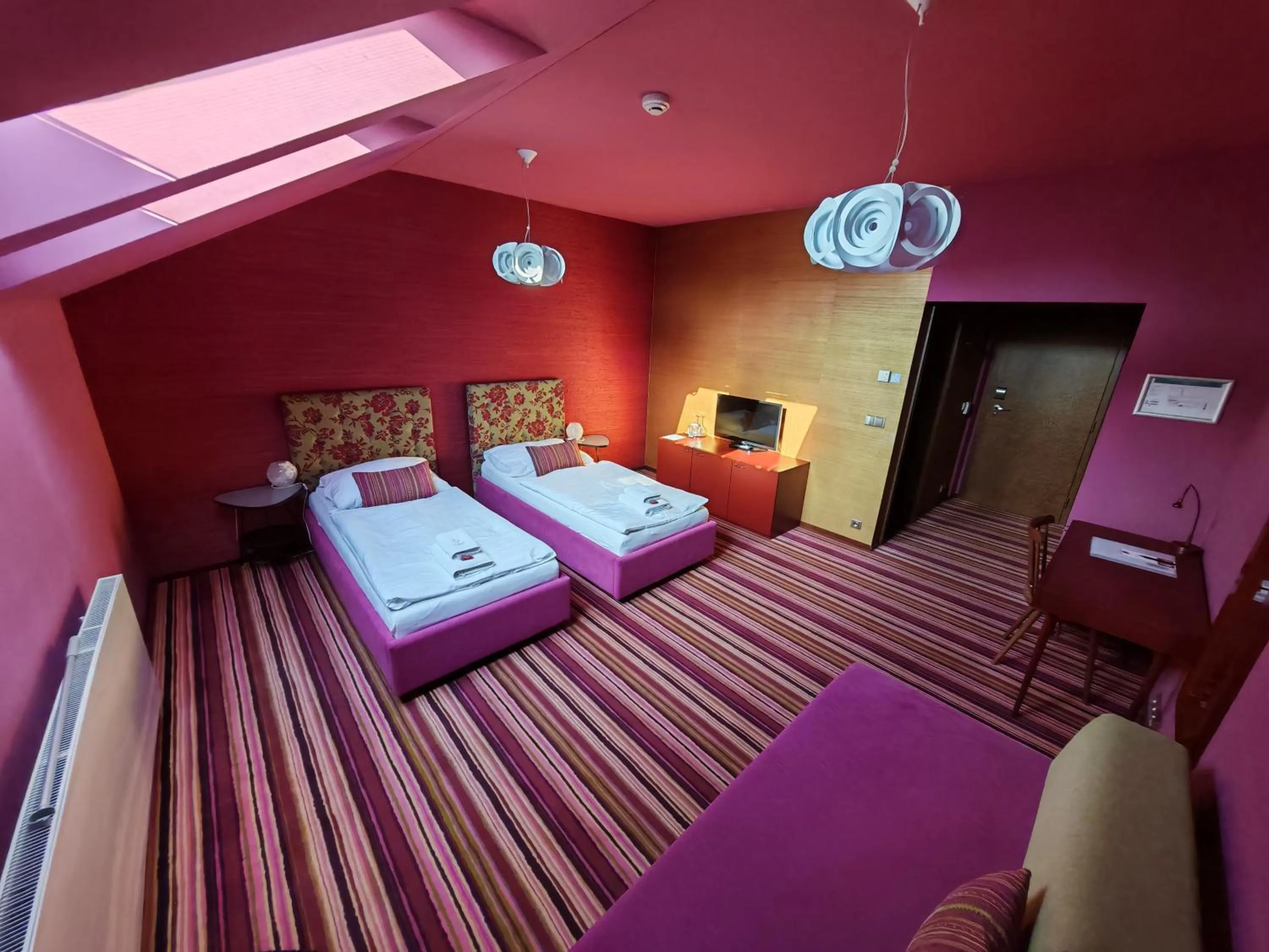 Bed in Hotel Rajská zahrada