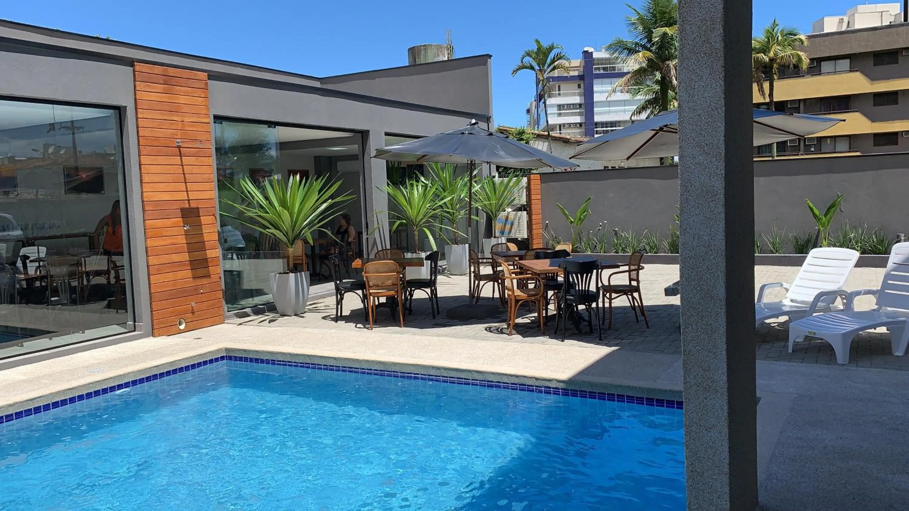 Swimming pool in Pousada Cadiz - Piscina Climatizada