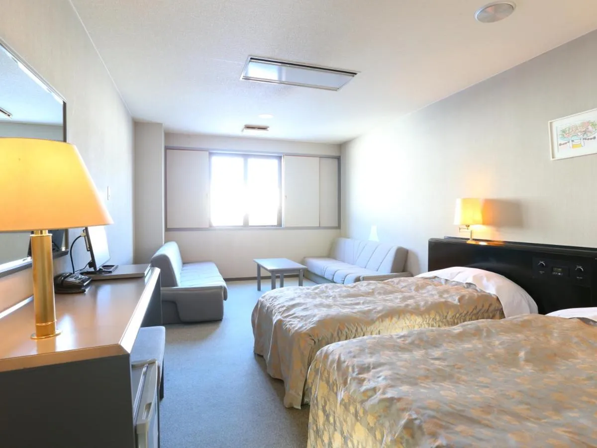 Photo of the whole room, Bed in Hotel Silk Inn Madarao