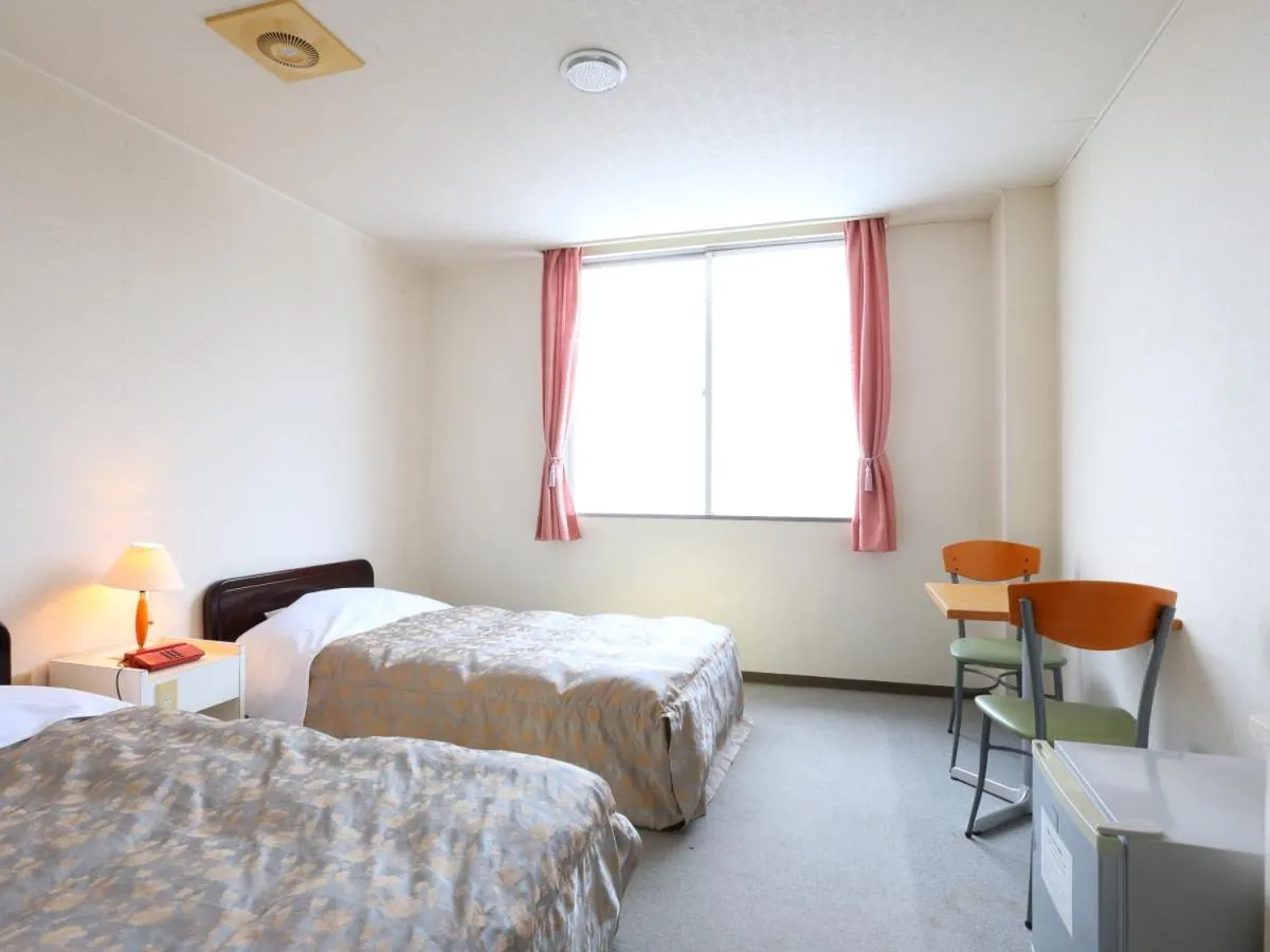 Photo of the whole room, Bed in Hotel Silk Inn Madarao