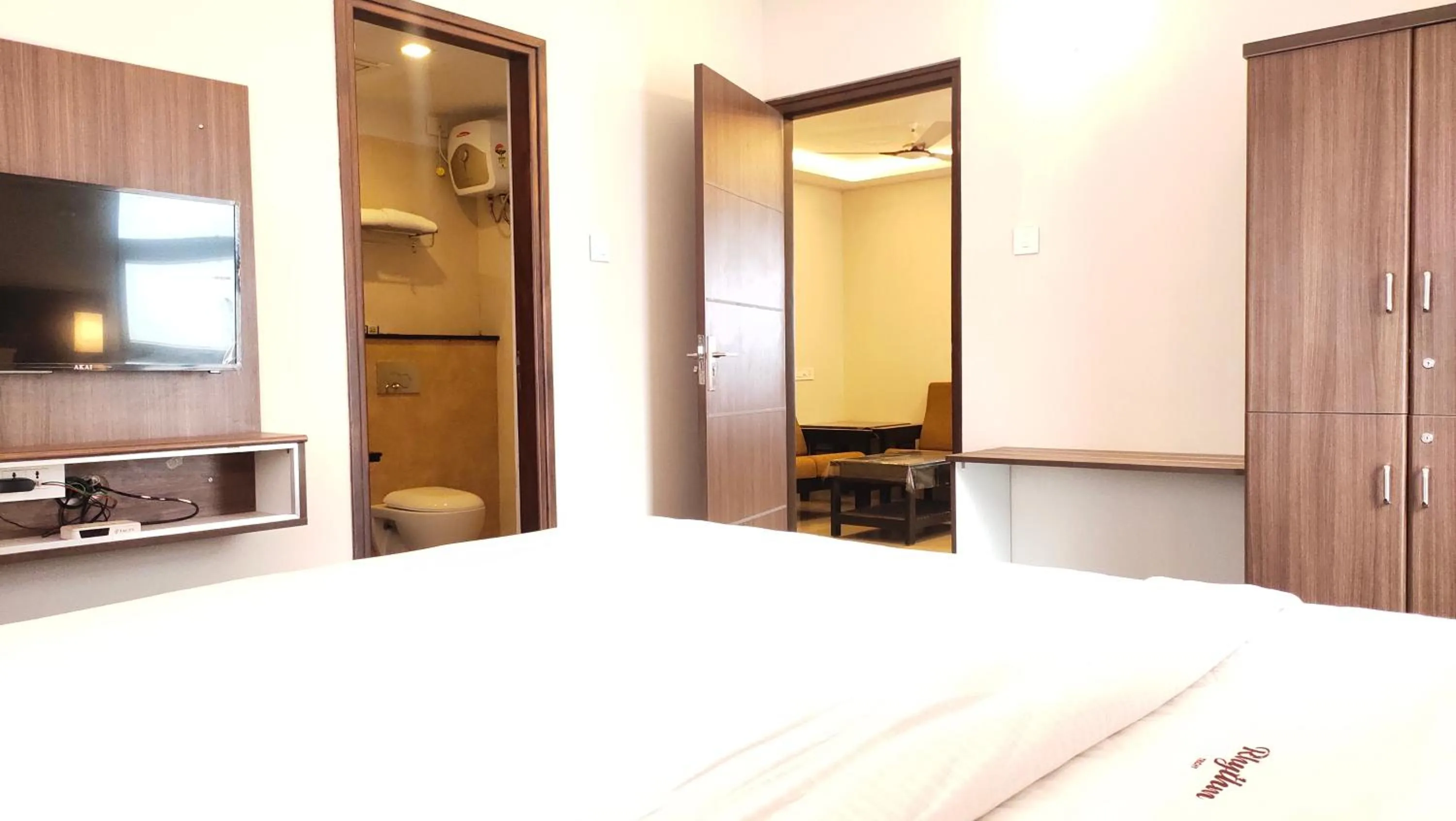 Bed in Hotel Rhythm Grand Suite