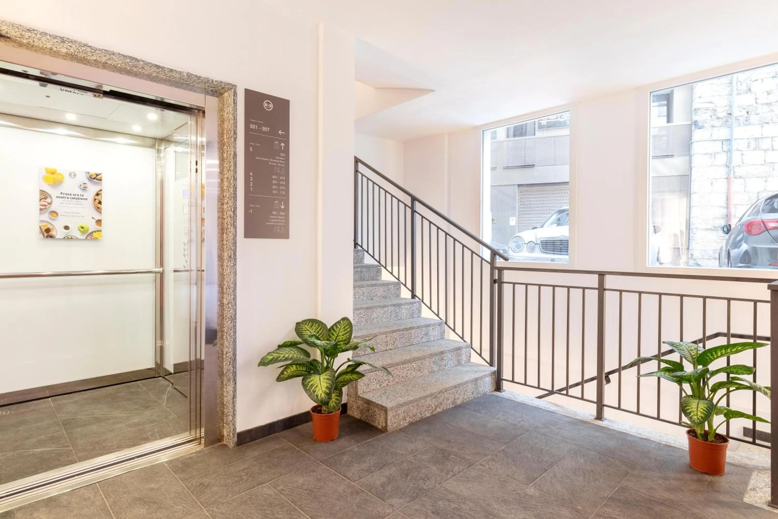 Lobby or reception in B&B Hotel Genova City Center