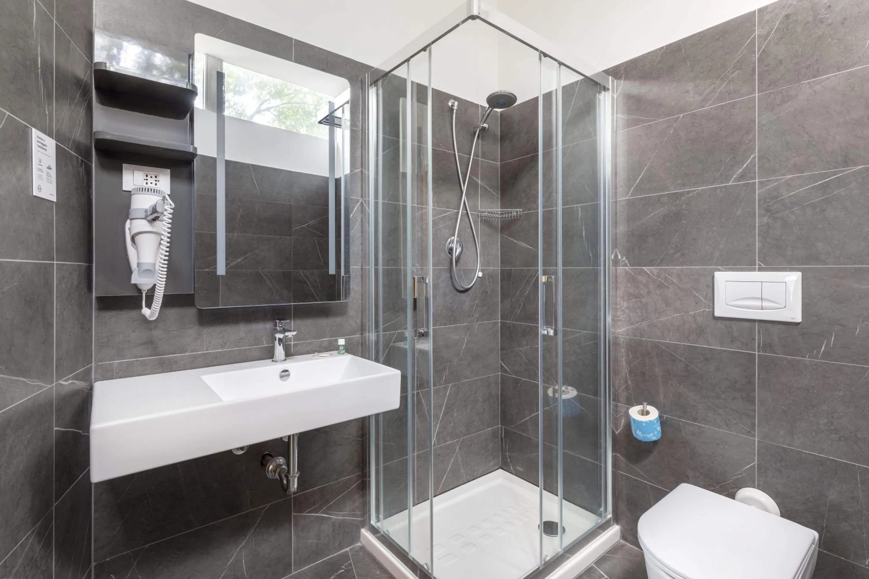 Photo of the whole room in B&B Hotel Pomezia Roma