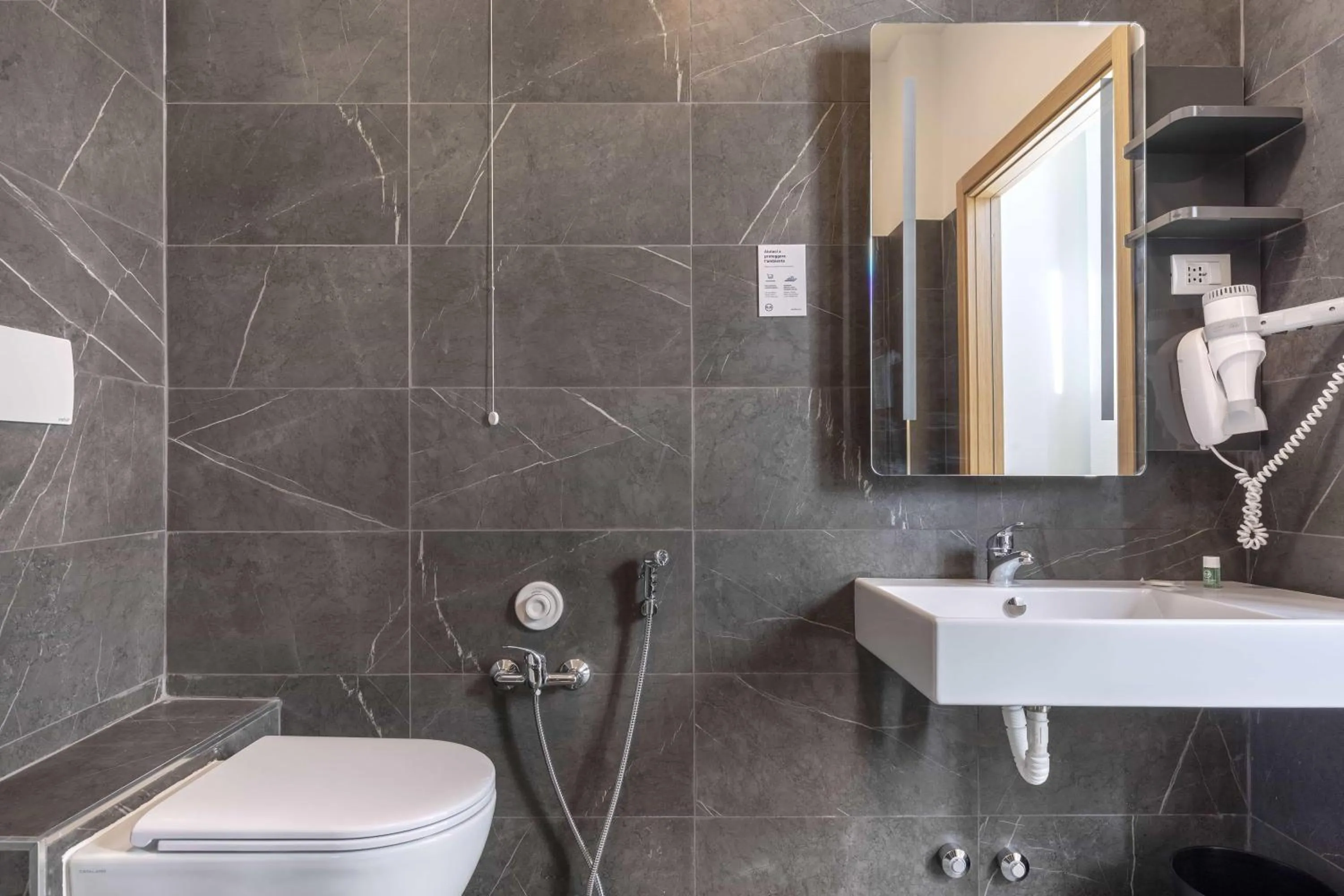 Photo of the whole room in B&B Hotel Pomezia Roma