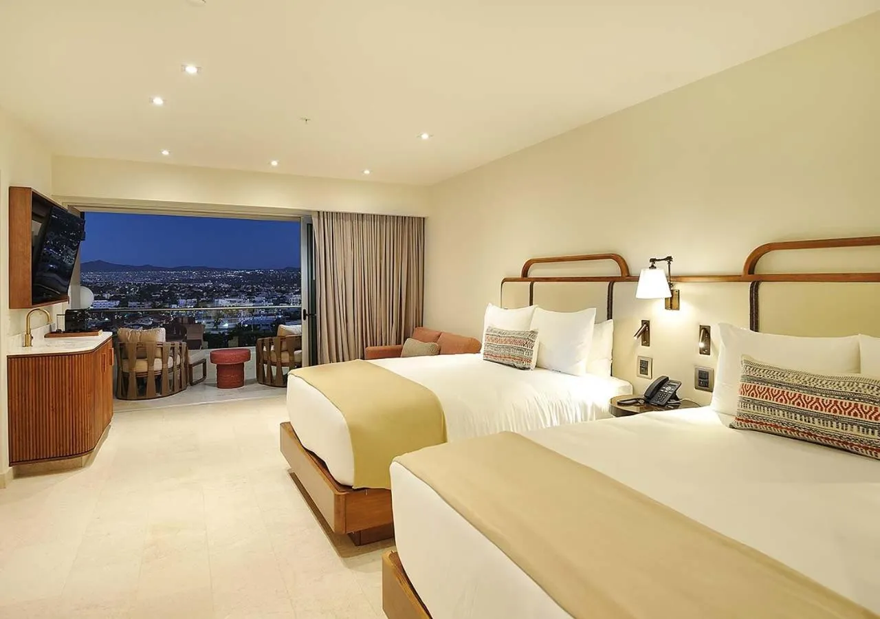 Bed in Corazón Cabo, a Noble House Resort