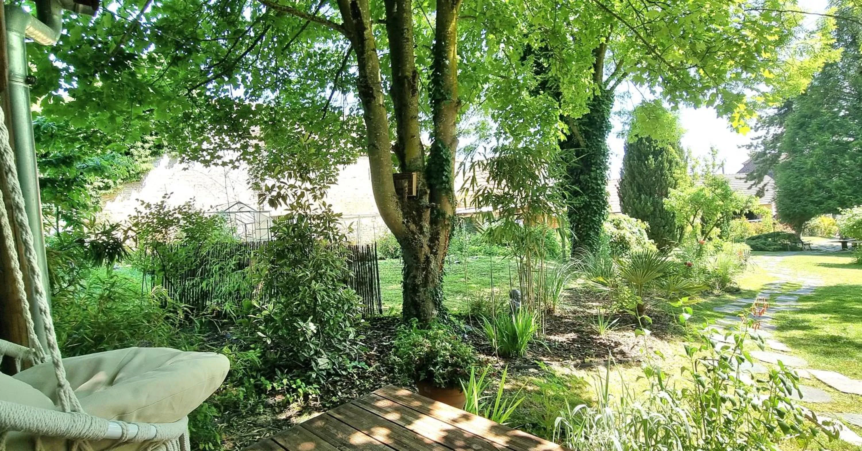 Garden in Les Glycines de Monchy- Chambres d'hôtes