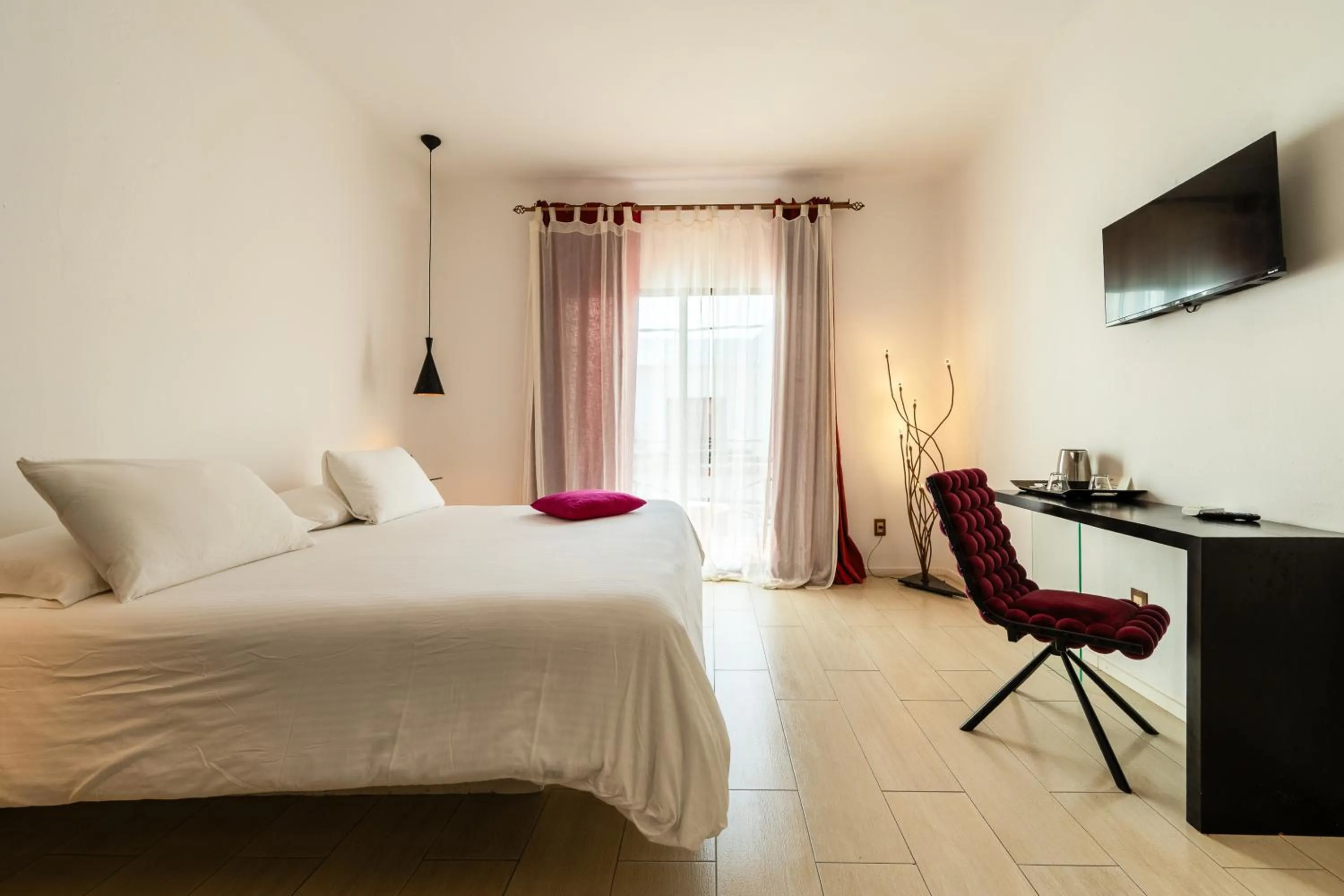 Bed in Kinbe Hotel Boutique