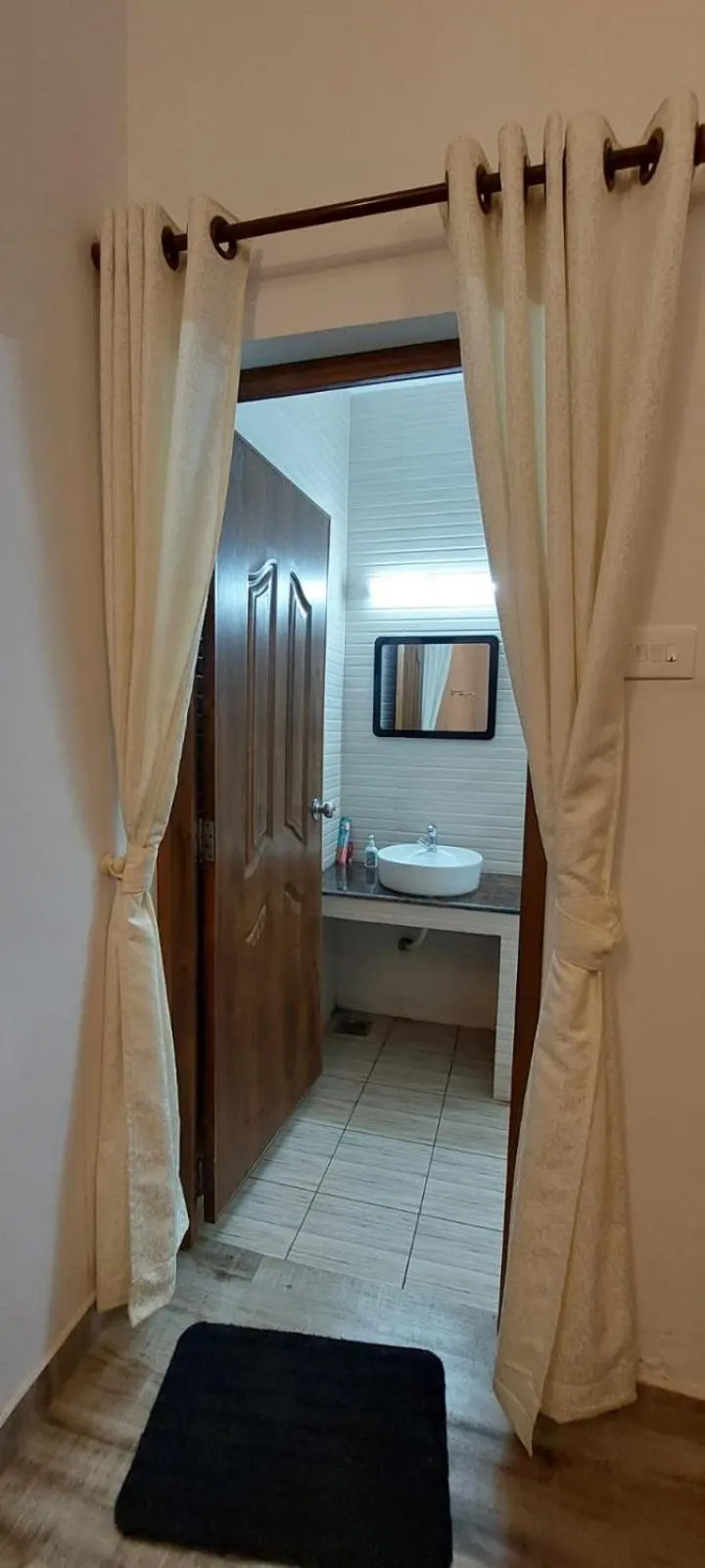 Bathroom, Bed in The Marine Pride Beach Resort & Spa