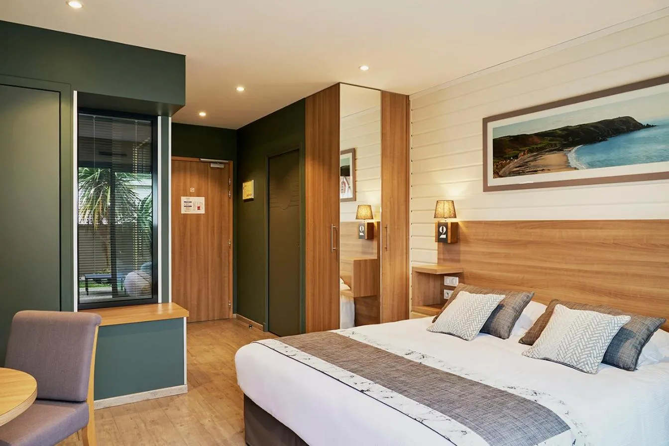 Bed in La Cremaillere Hôtel-Restaurant