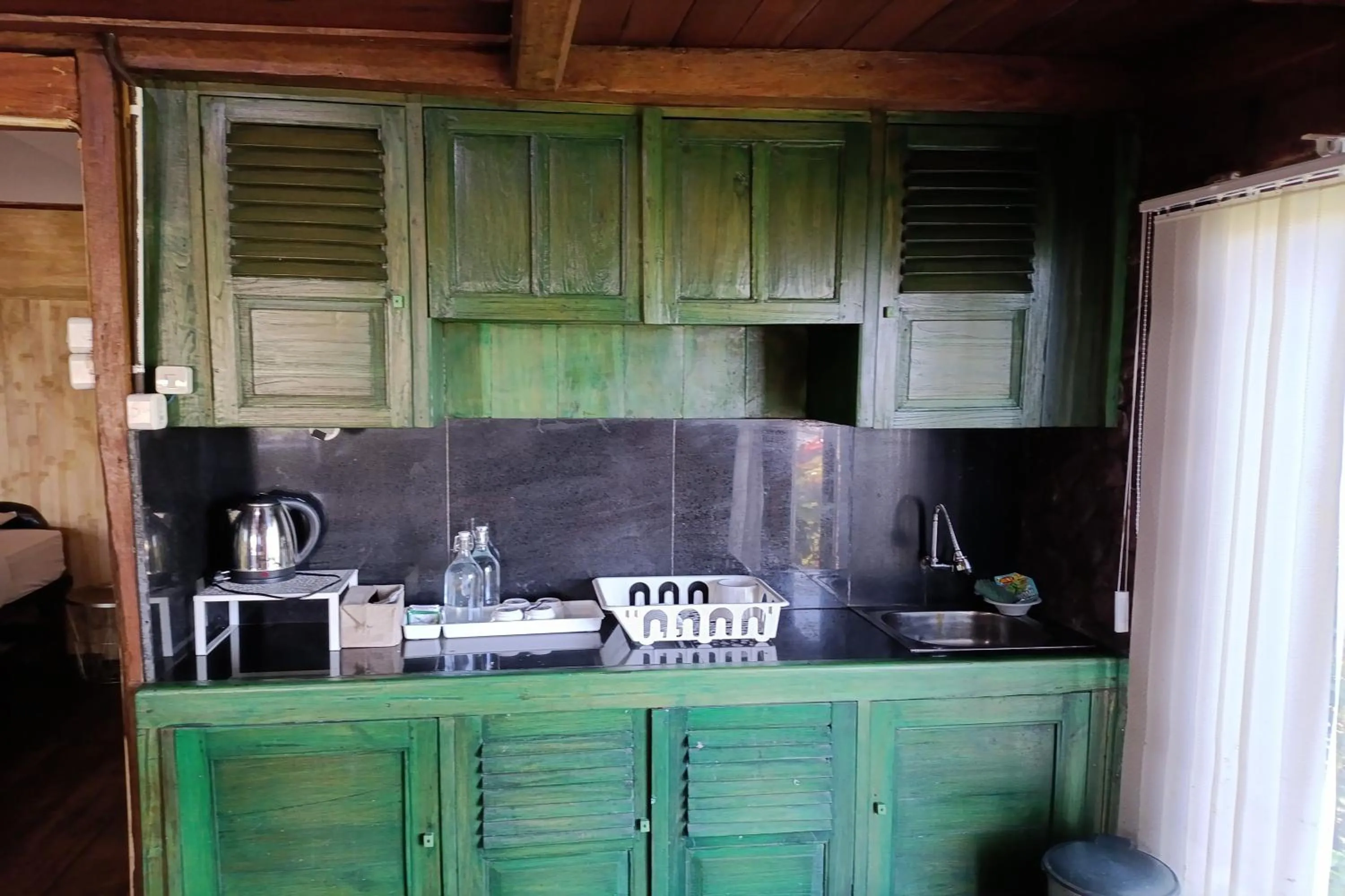 Kitchen or kitchenette in Mendulang by Belza