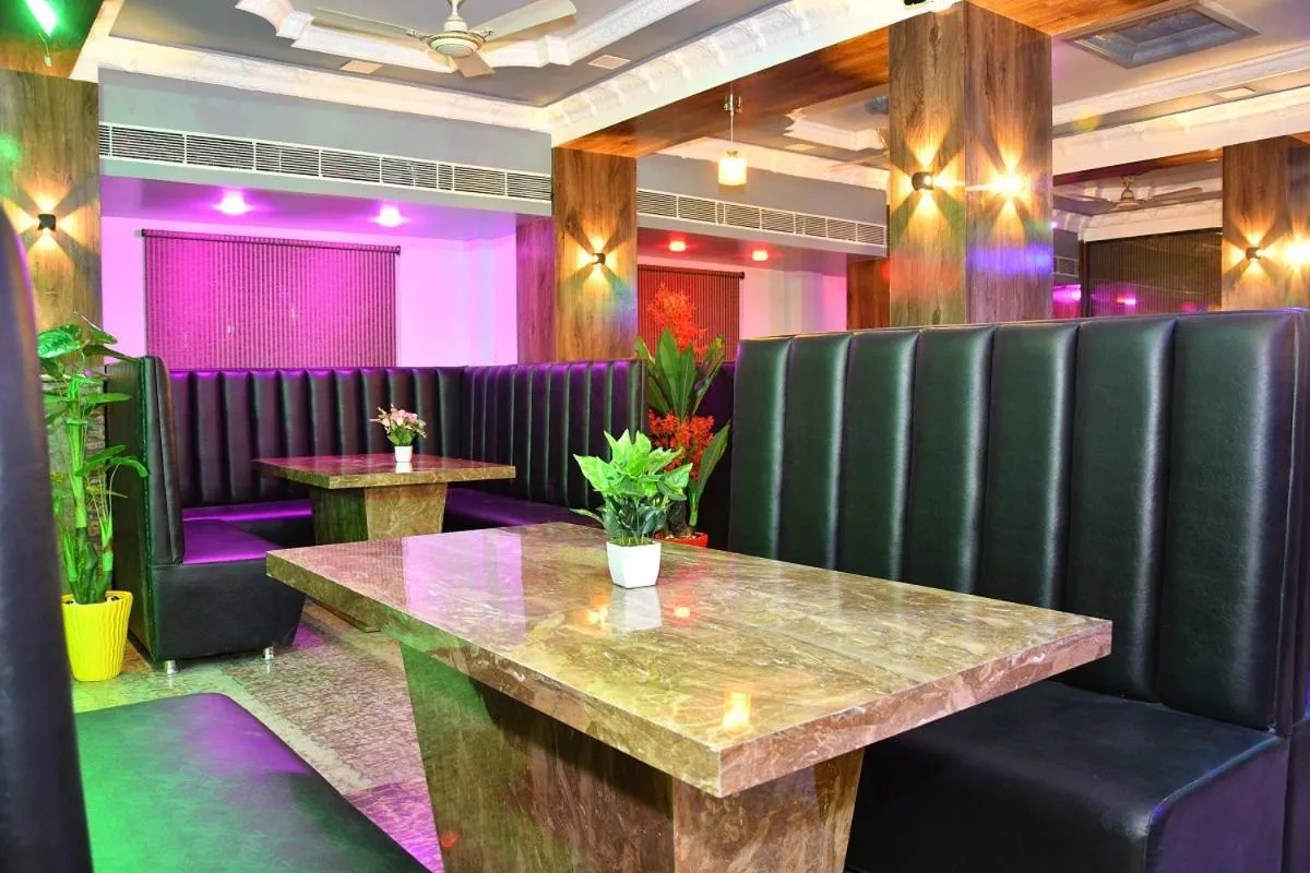 Seating area in Ganpati Plaza Hotel