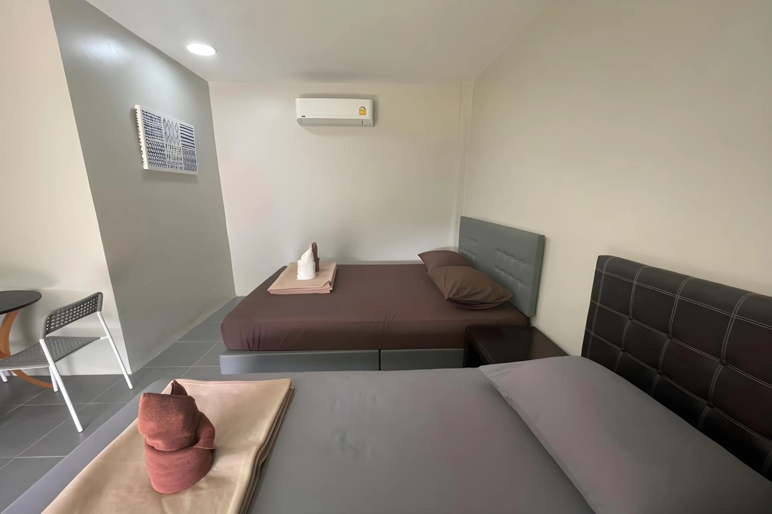 Bed in Davy Cottage Phuket