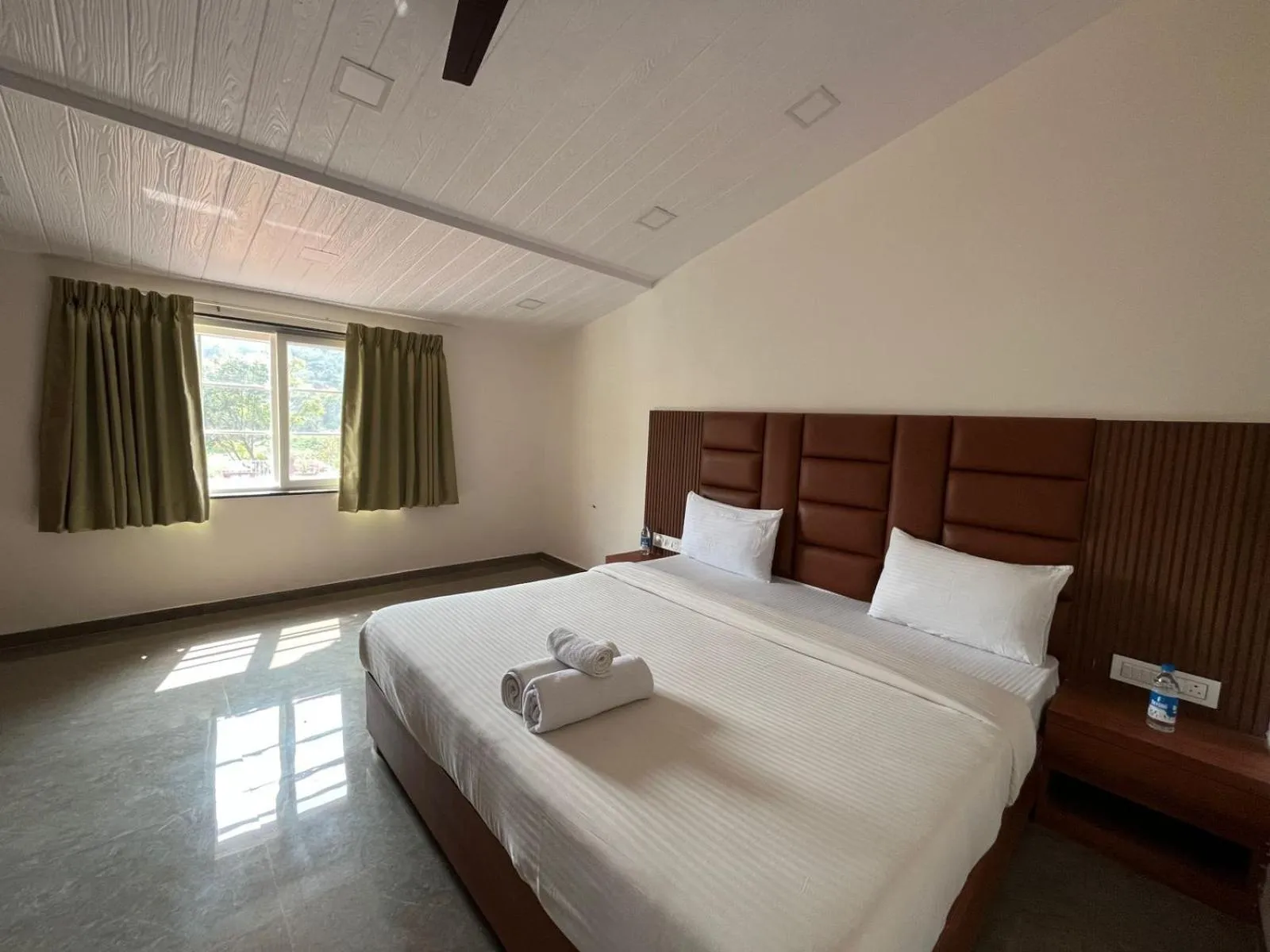 Bed in Khushi Riverside Resort & Spa