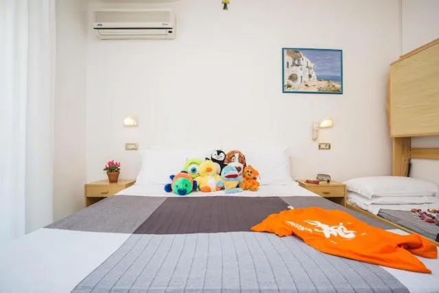 Bed in HOTEL TRE ROSE