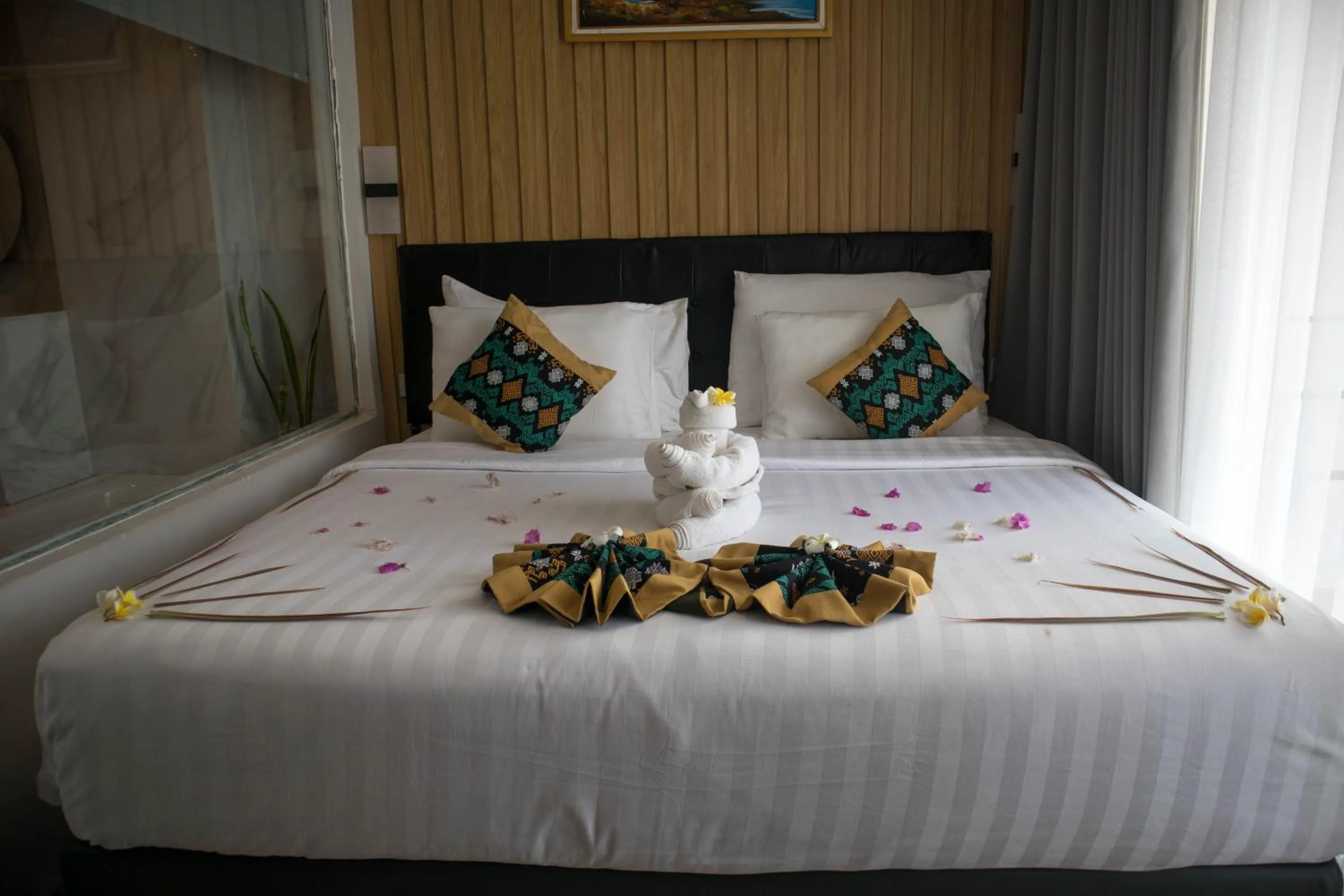 Bed in Raja Hotel Kuta Mandalika Resort & Convention