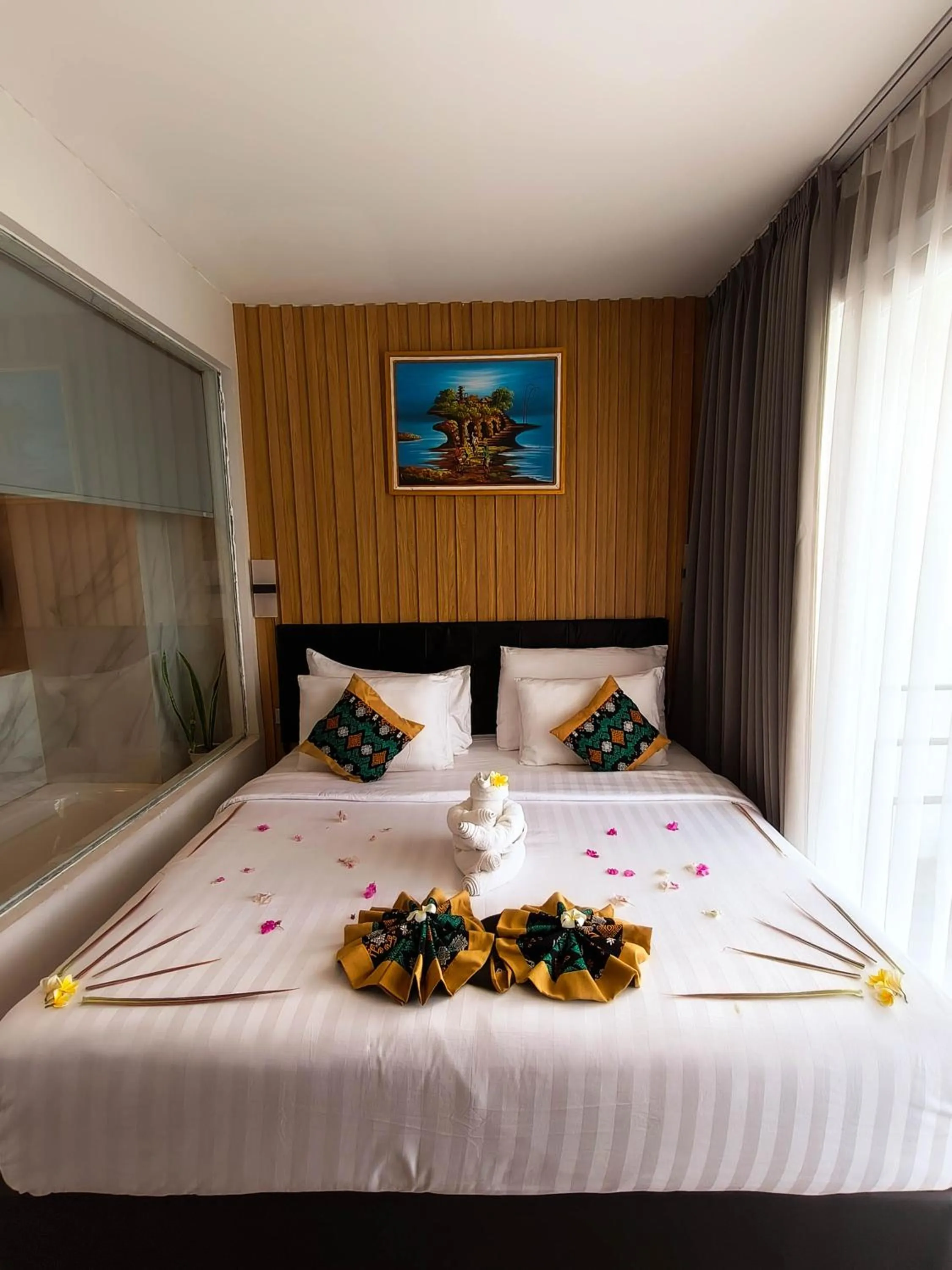 Bed in Raja Hotel Kuta Mandalika Resort & Convention