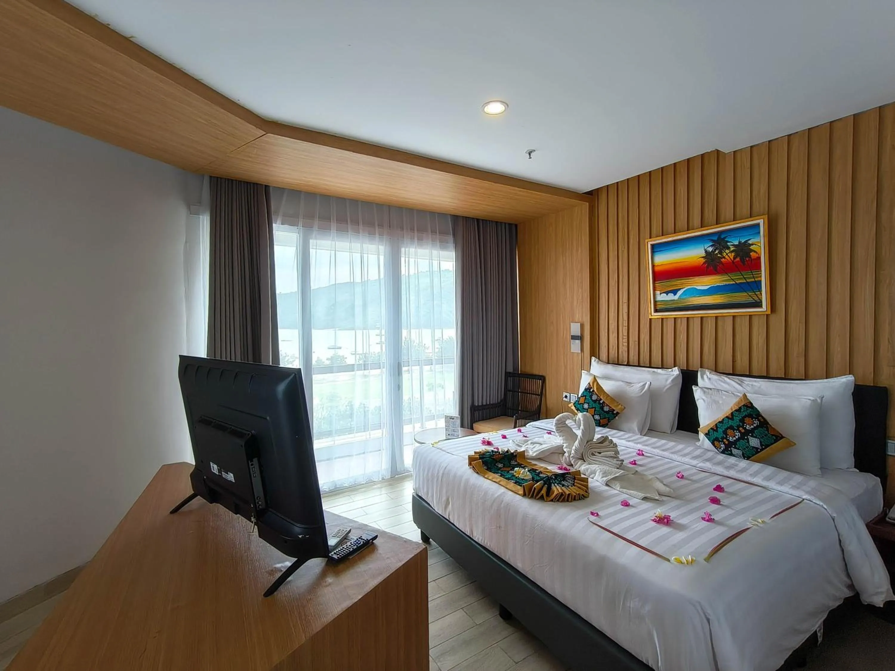 TV and multimedia, Bed in Raja Hotel Kuta Mandalika Resort & Convention