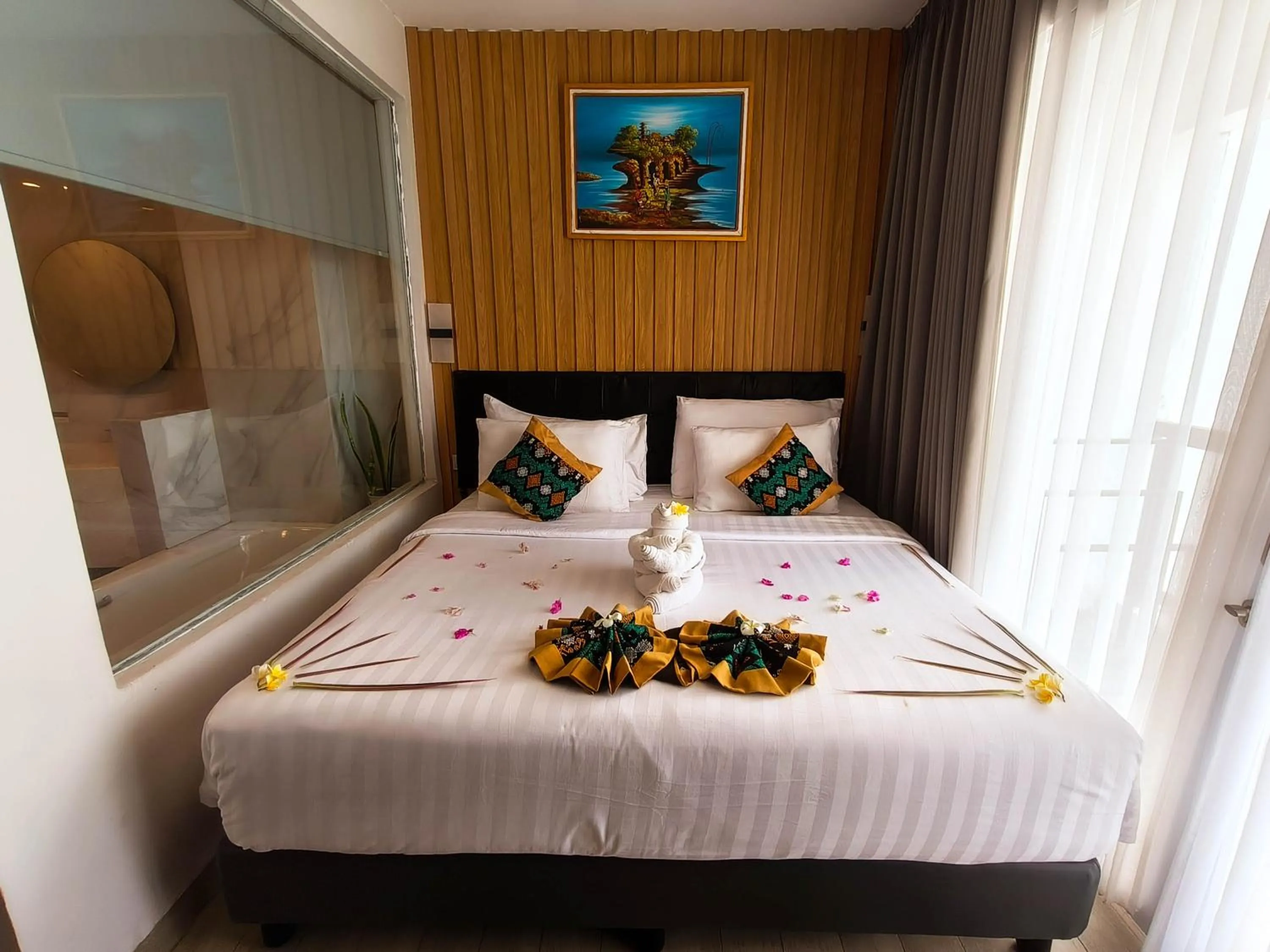 Bed in Raja Hotel Kuta Mandalika Resort & Convention