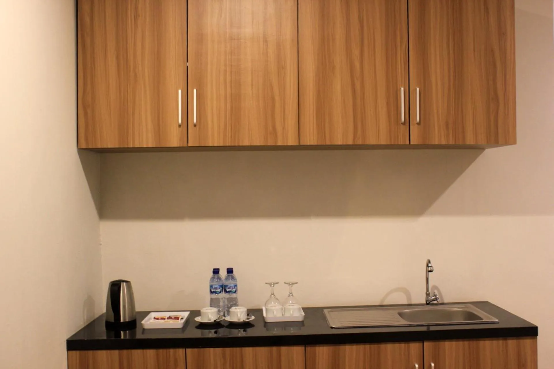 Kitchen or kitchenette in Raja Hotel Kuta Mandalika Resort & Convention